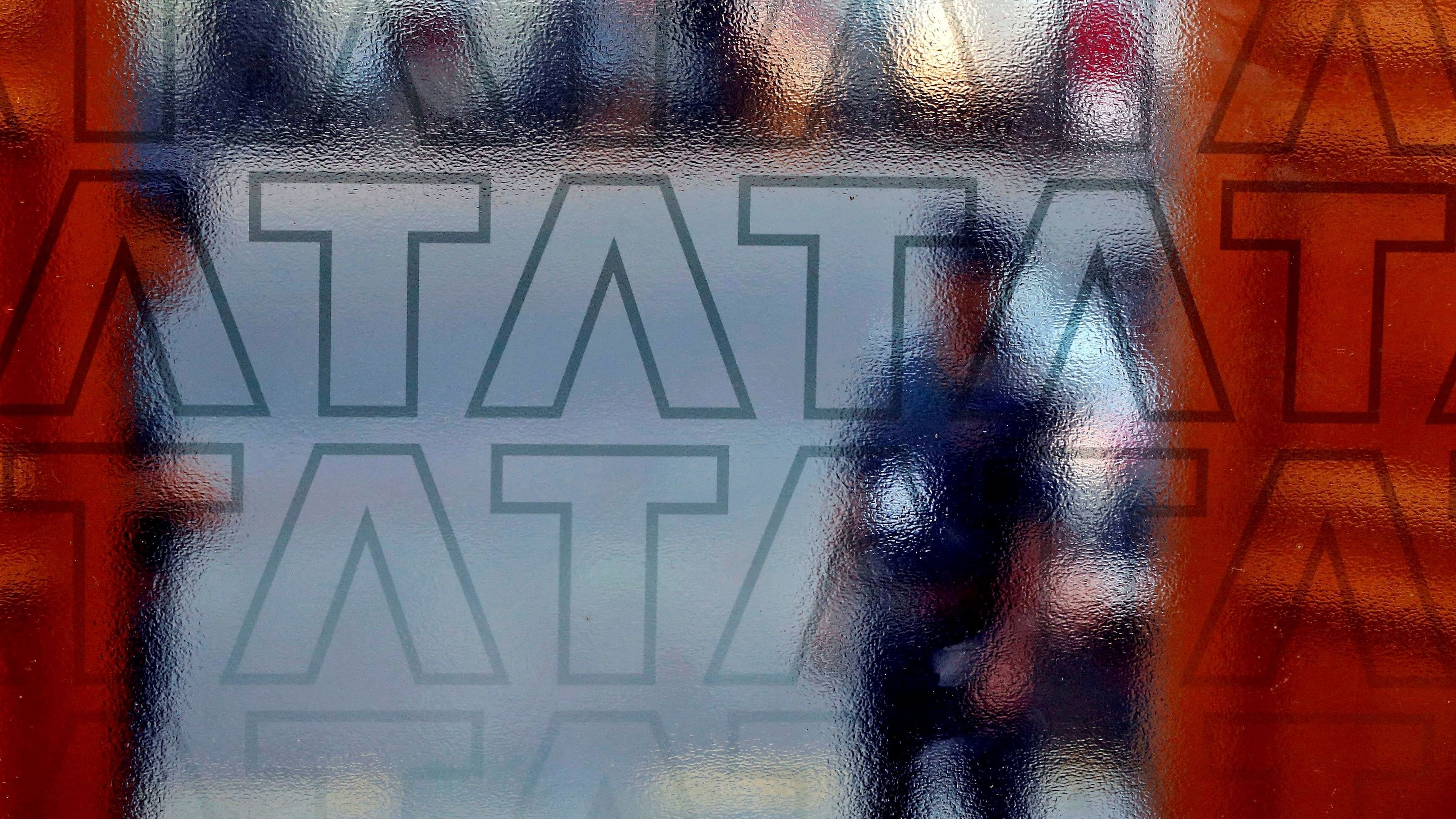 <div class="paragraphs"><p>A private security guard stands at the exit gate of the headquarters of TCS in Mumbai.&nbsp;</p></div>