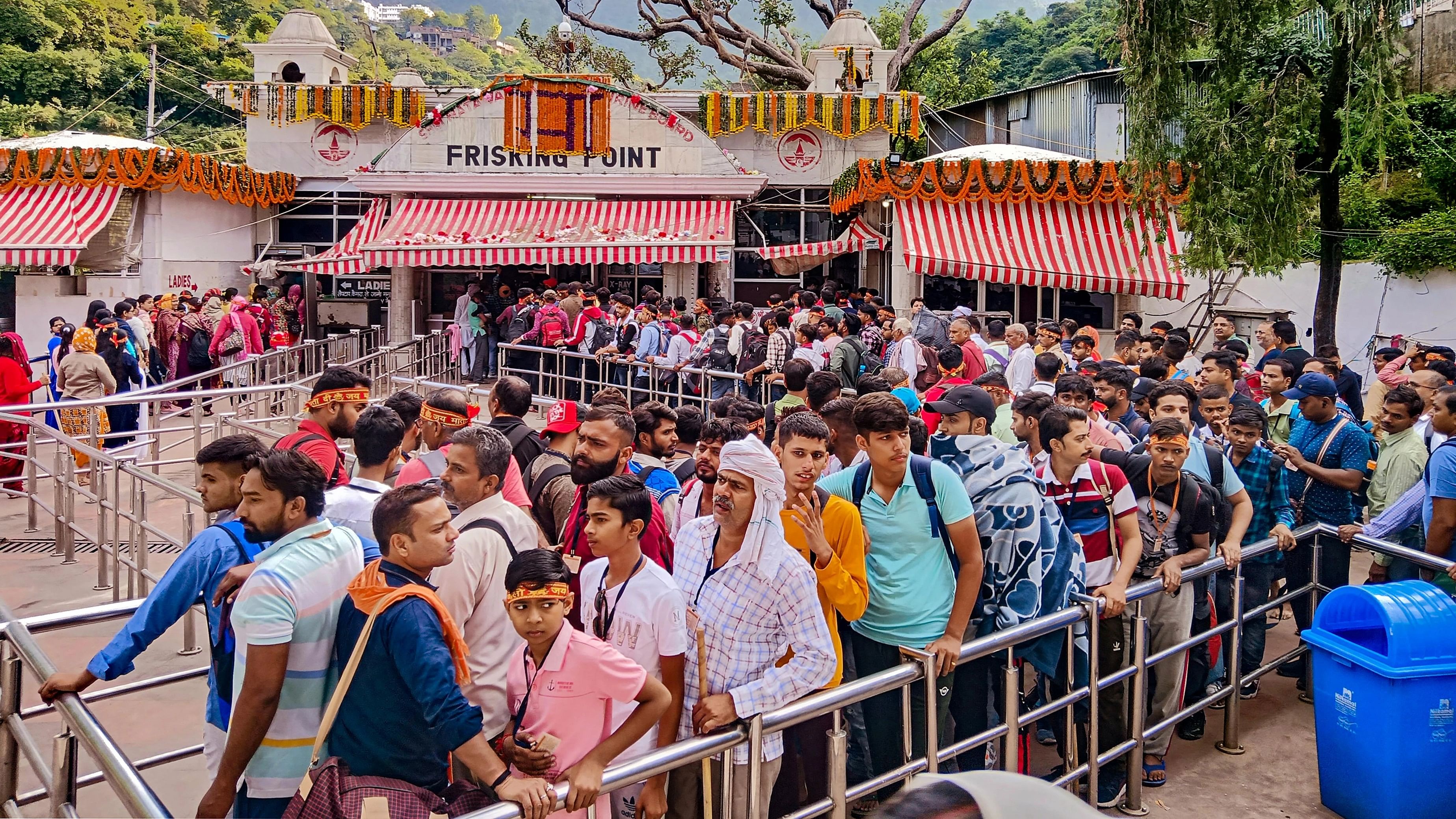 <div class="paragraphs"><p>Devotees wait in queues at 'Darshani Deodi' on the way to Mata Vaishno Devi shrine on the first day of the Navratri festival.</p></div>