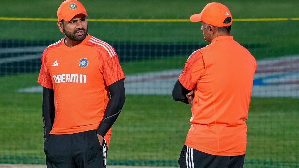 <div class="paragraphs"><p>India's captain Rohit Sharma and coach Rahul Dravid inspect the pitch during a practice session ahead of the ICC Men's Cricket World Cup 2023 match between India and New Zealand, at HPCA Stadium, in Dharamshala.</p></div>