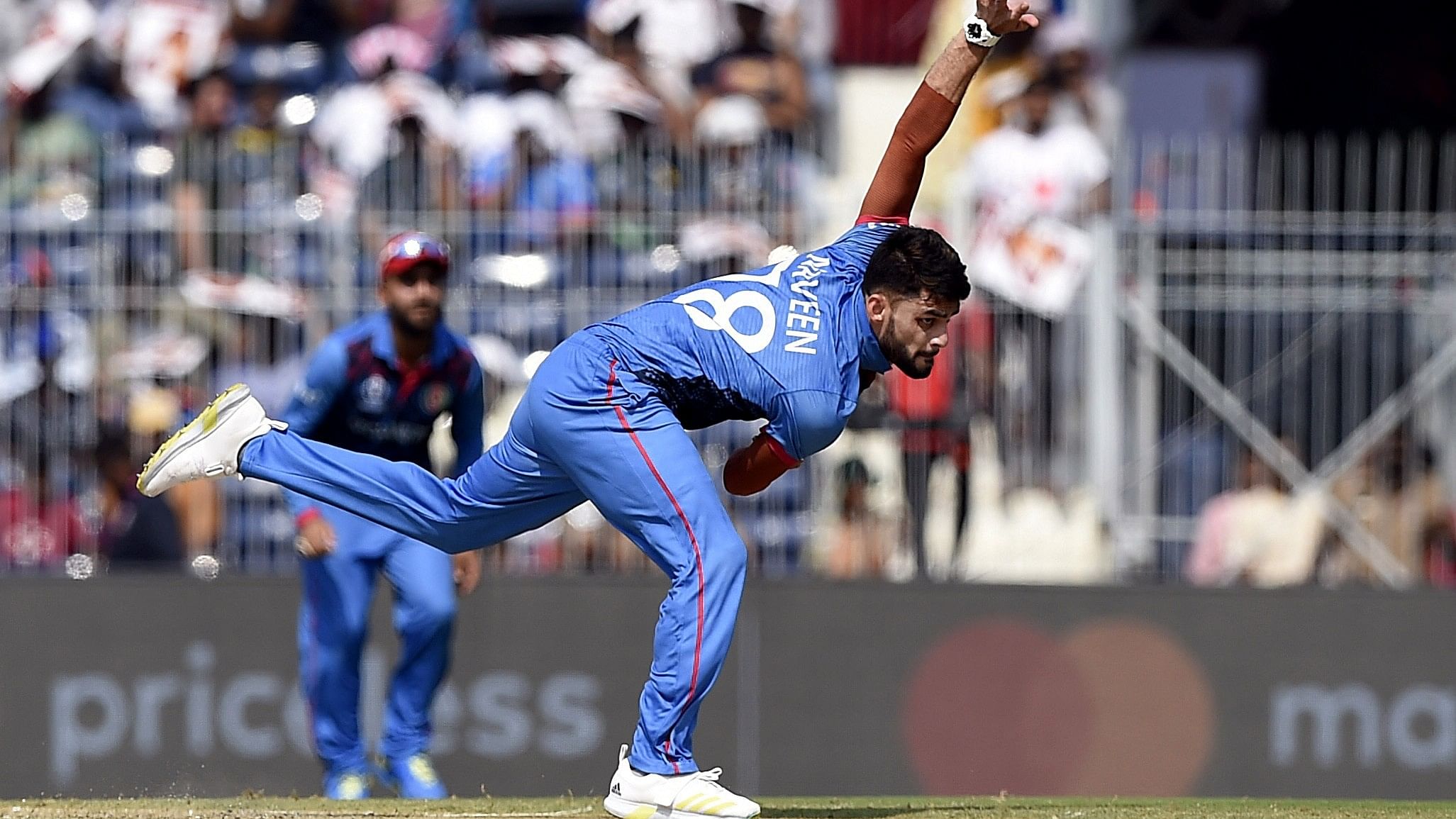 <div class="paragraphs"><p> Afghanistan's Naveen-ul-Haq in action against Pakistan</p></div>