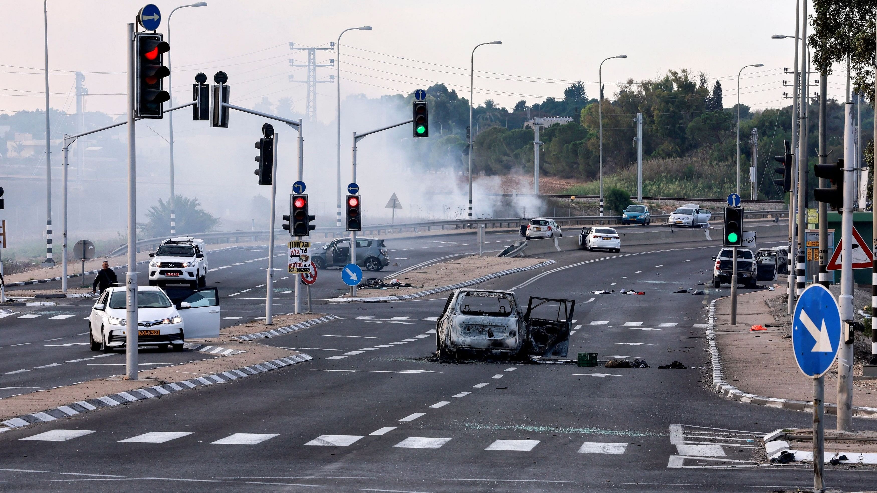 <div class="paragraphs"><p>A view of a junction shows the aftermath of a mass infiltration by Hamas gunmen from the Gaza Strip, in the Sderot area, southern Israel October 7, 2023. </p></div>