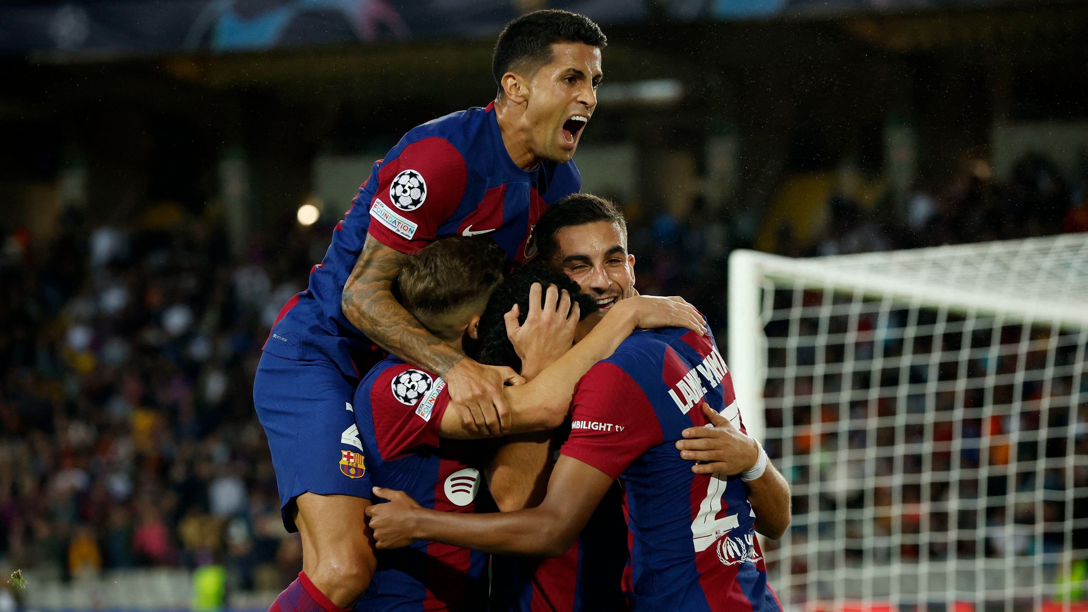 <div class="paragraphs"><p>FC Barcelona's Ferran Torres celebrates scoring their first goal with teammates.</p></div>