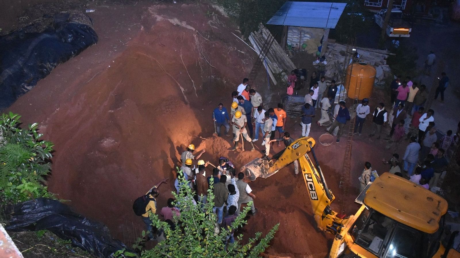 <div class="paragraphs"><p>Fire and emergency services personnel clear  debris after the mudslide at a construction site in Madikeri.&nbsp;</p></div>