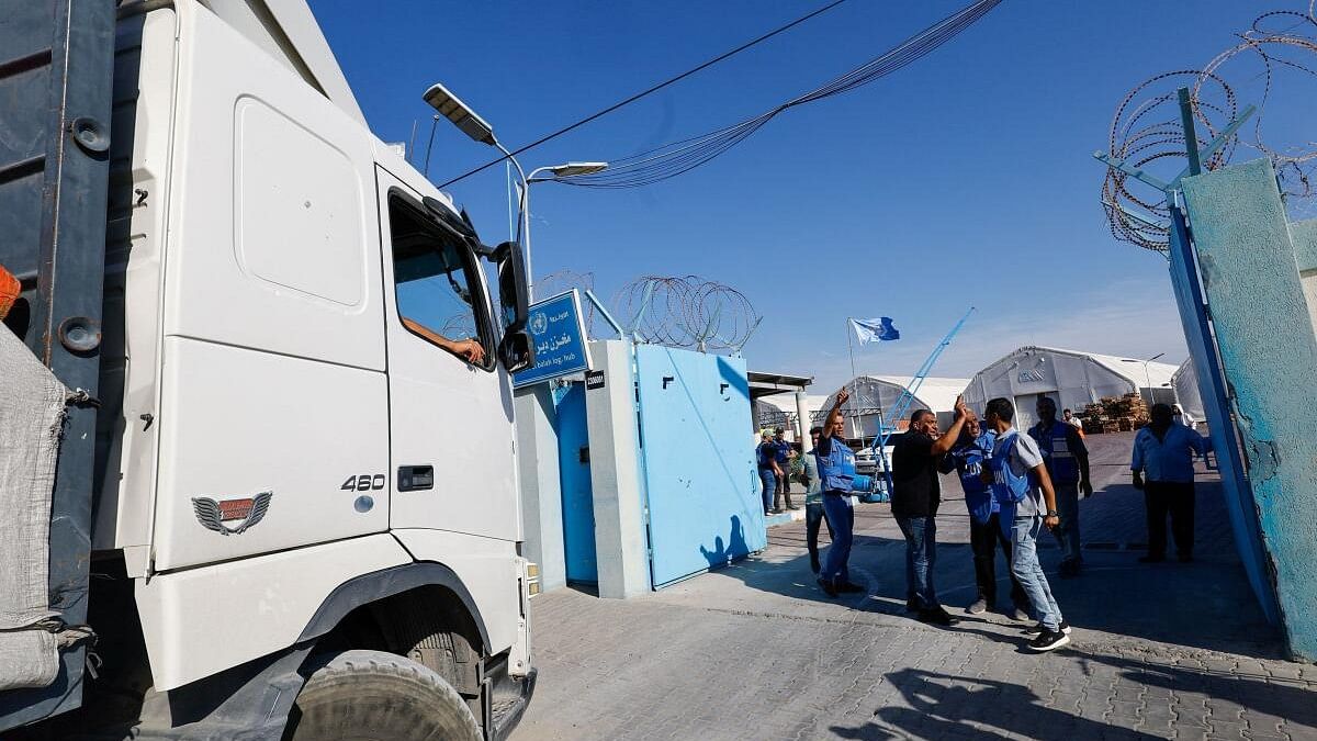 <div class="paragraphs"><p>An aid truck arrives at a UN storage facility as the conflict between Israel and Palestinian Islamist group Hamas continues, in the central Gaza Strip.</p></div>