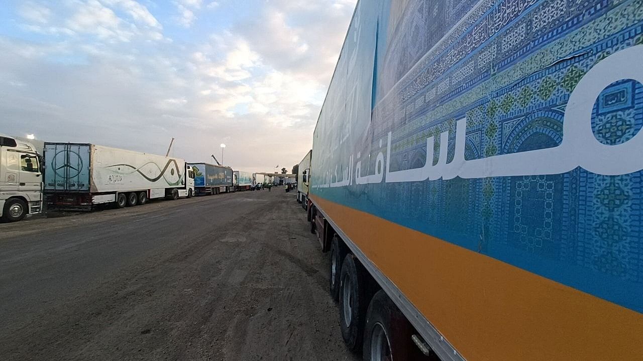 <div class="paragraphs"><p>A convoy of trucks carrying humanitarian aid from Egyptian NGOs for Palestinians waits for a decision for the Rafah crossing to open, to enter Gaza, amid the ongoing conflict between Israel and the Palestinian Islamist group Hamas, in Rafah, Egypt October 17, 2023. </p></div>