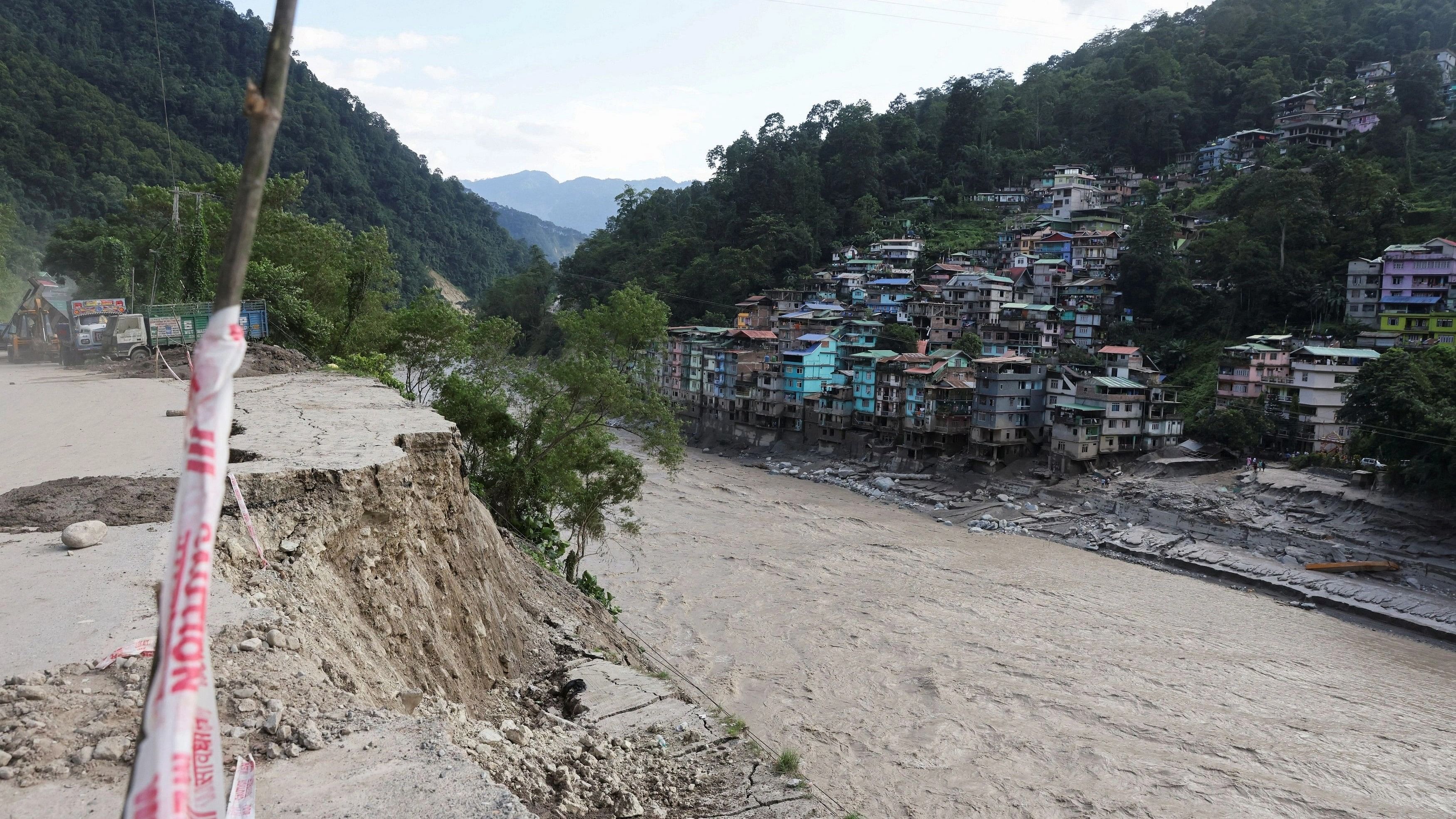 <div class="paragraphs"><p>A view of damaged houses after flash floods, caused by a lake burst in Sikkim. </p></div>