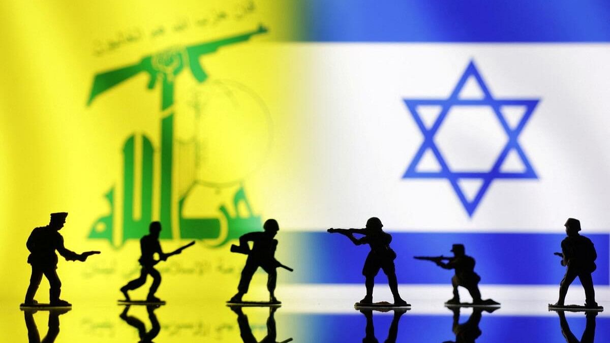 <div class="paragraphs"><p>Hezbollah and Israel flags are seen in this illustration taken, October 15, 2023.</p></div>