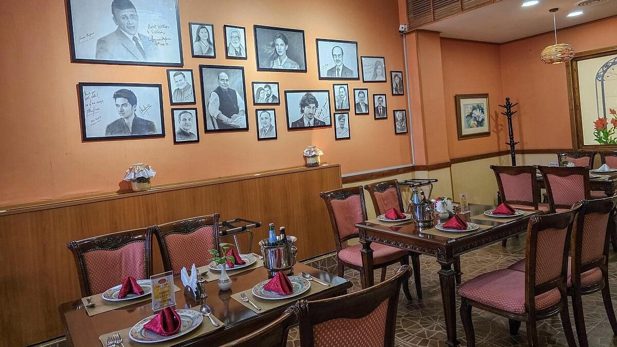<div class="paragraphs"><p>Wall dedicated to Indian celebrities who visited Raj Kapoor restaurant in Tashkent.</p></div>