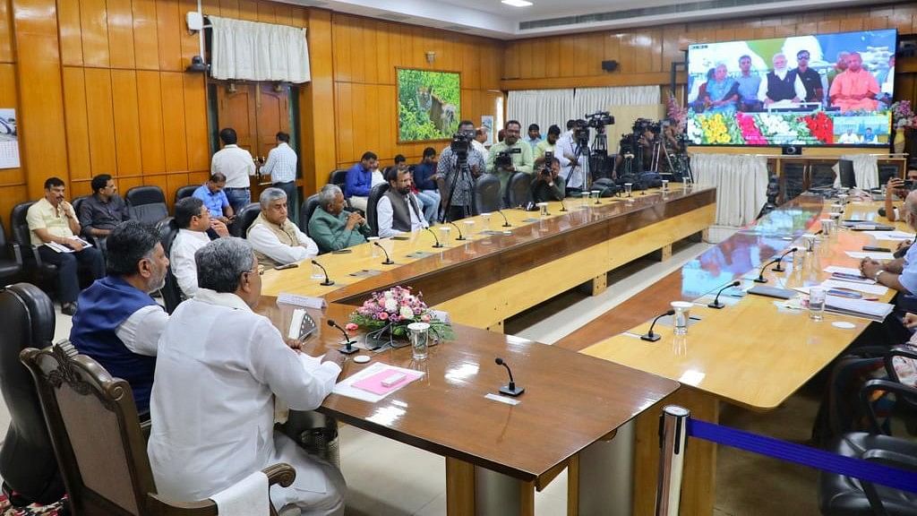 <div class="paragraphs"><p>Chief Minister Siddaramaiah, along with Deputy Chief Minister D K Shivakumar, State Institute for Transformation of Karnataka's vice chairperson Rajeev Gowda, MLA S T Somashekar, and others joined in on the virtual meeting at the Krishna Office on Kumara Krupa Road in the city on Friday.</p></div>