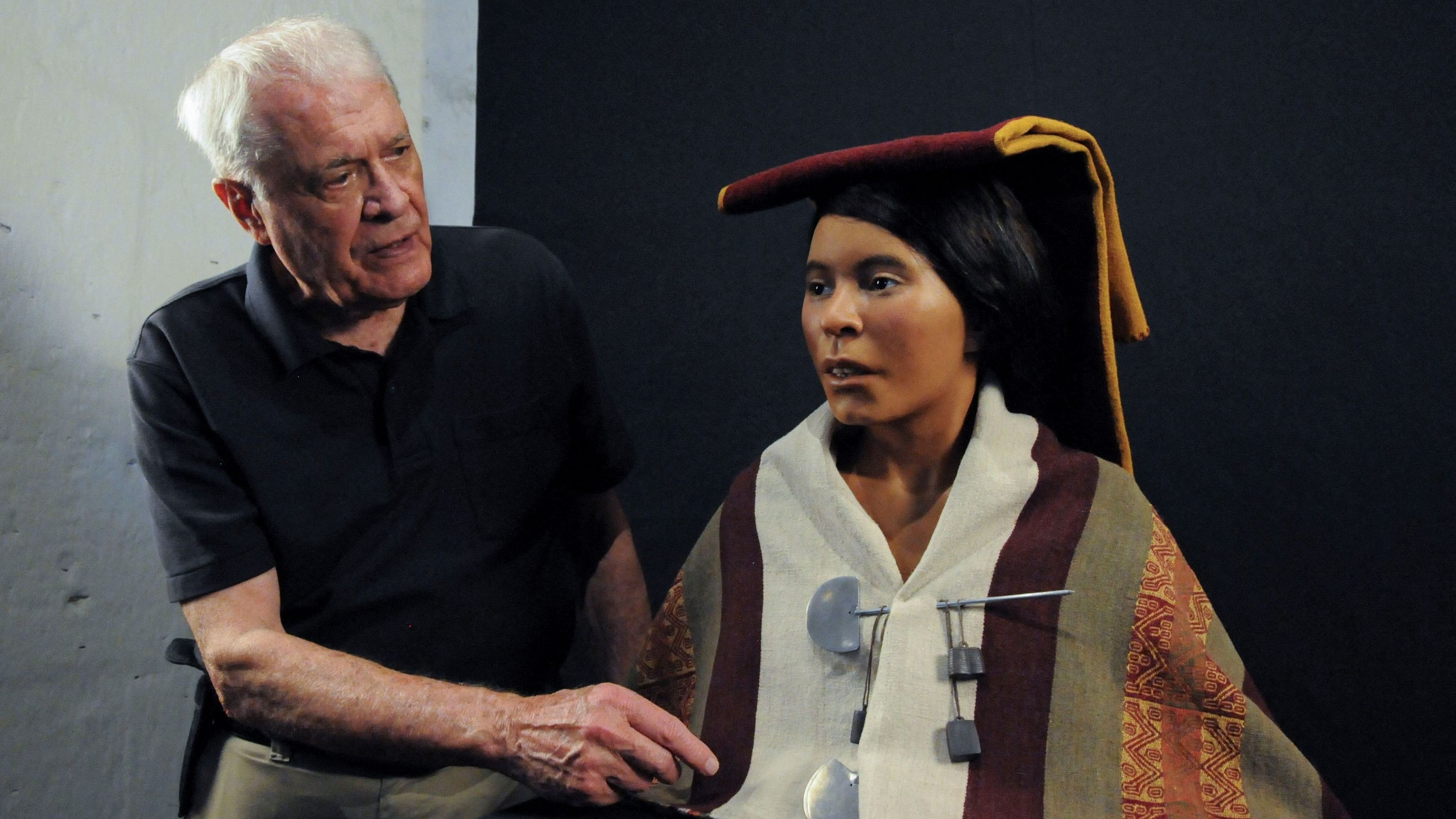 <div class="paragraphs"><p>US Archaeologist Johan Reinhard stands next to the reconstructed face, using three-dimensional technology, of a girl that was sacrificed over 500 years ago and whose frozen body was discovered in 1995.</p></div>