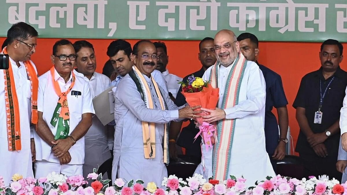 <div class="paragraphs"><p>Union Home Minister Amit Shah being felicitated by Chhattisgarh BJP President Arun Sao during a public meeting, in Rajnandgaon, Chhattisgarh.&nbsp;</p></div>