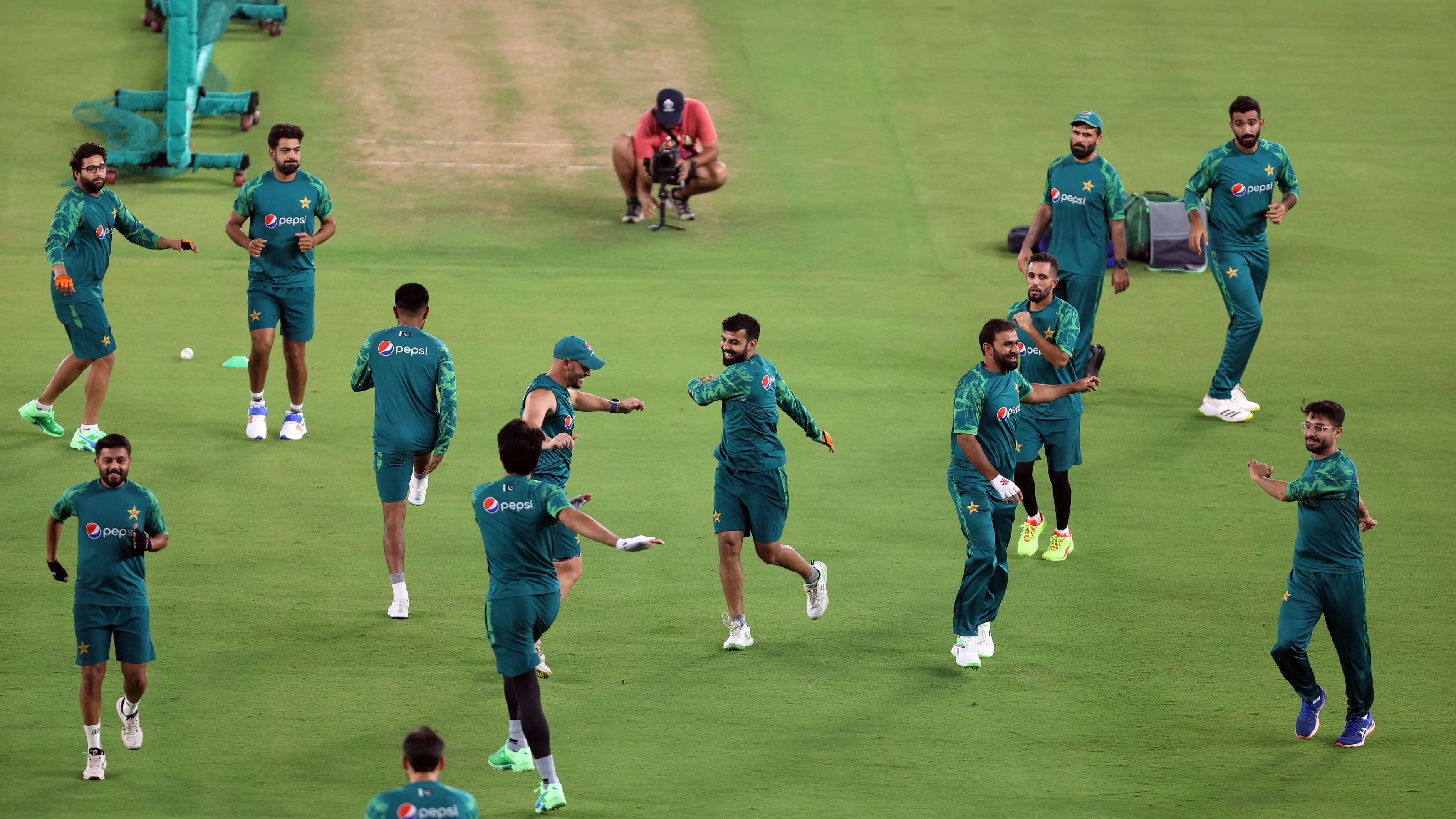 Pakistan cricketers go through their stretches during a training session at the Narendra Modi Stadium in Ahmedabad on Thursday. REUTERS