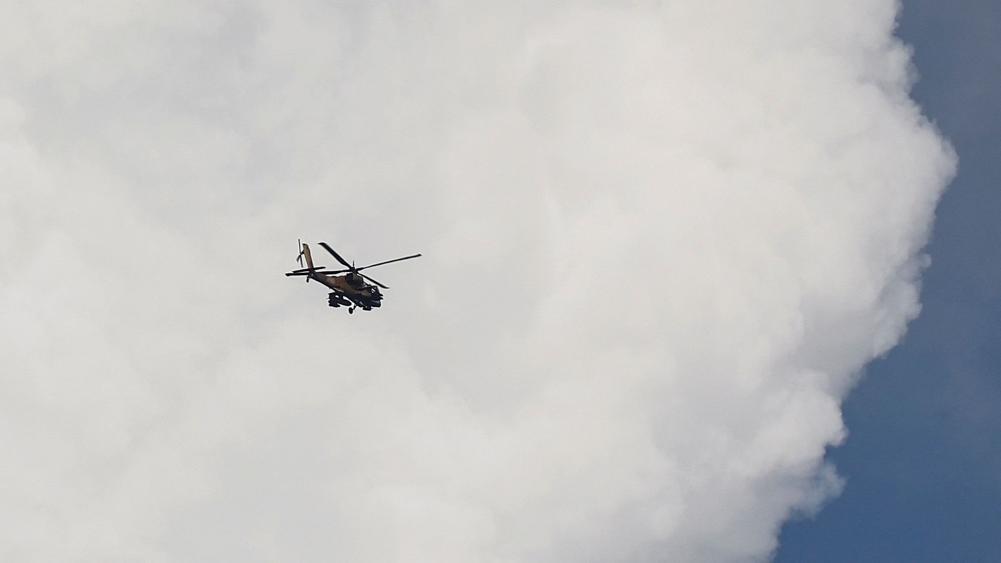 <div class="paragraphs"><p>A view of an Israeli Apache helicopter in the skies over Israel's border with Lebanon, in northern Israel, October 18, 2023.</p></div>