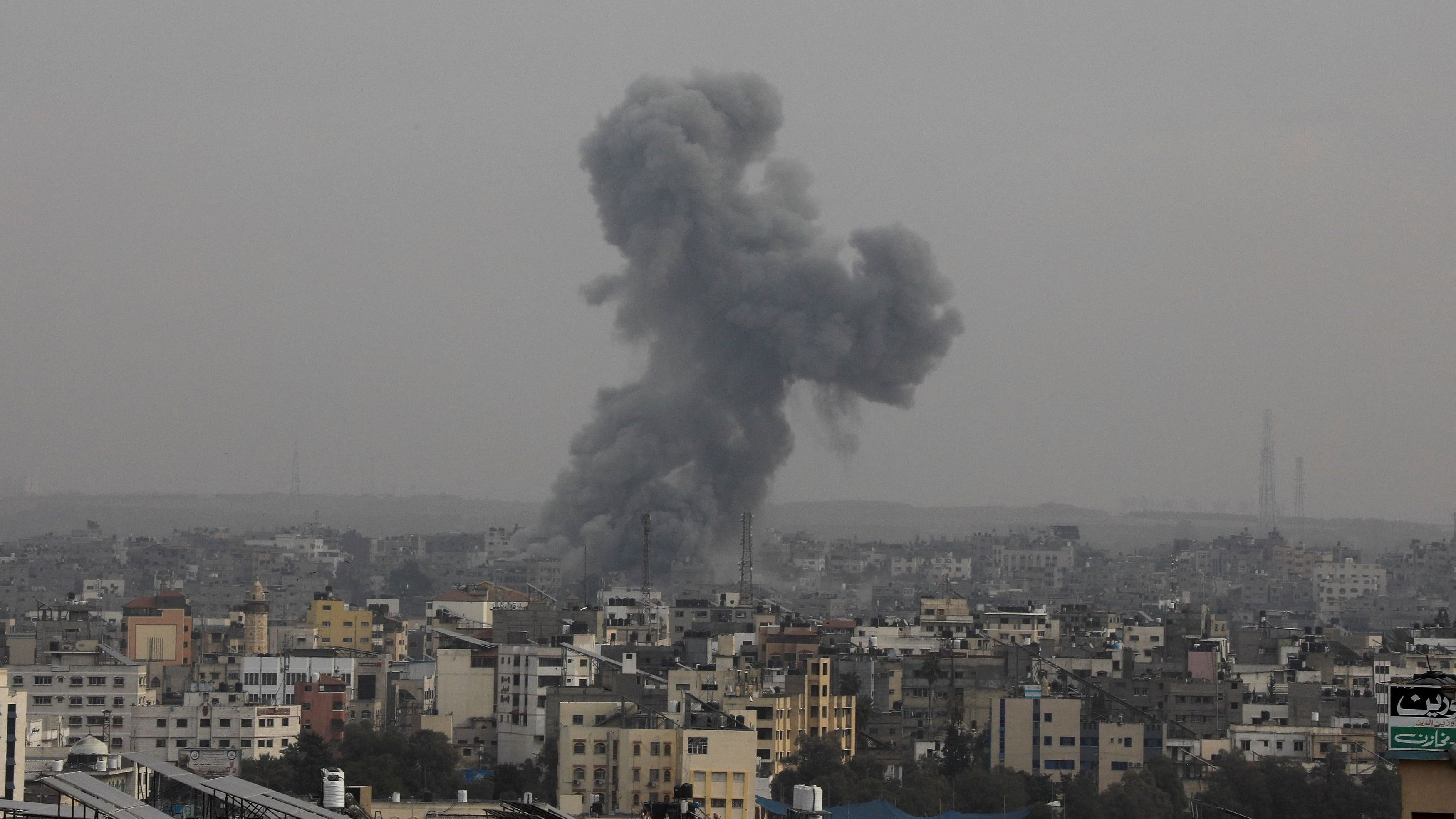 <div class="paragraphs"><p>Smoke rises during Israeli strikes, amid the ongoing conflict between Israel and Palestinian Islamist group Hamas, in Gaza City.</p></div>