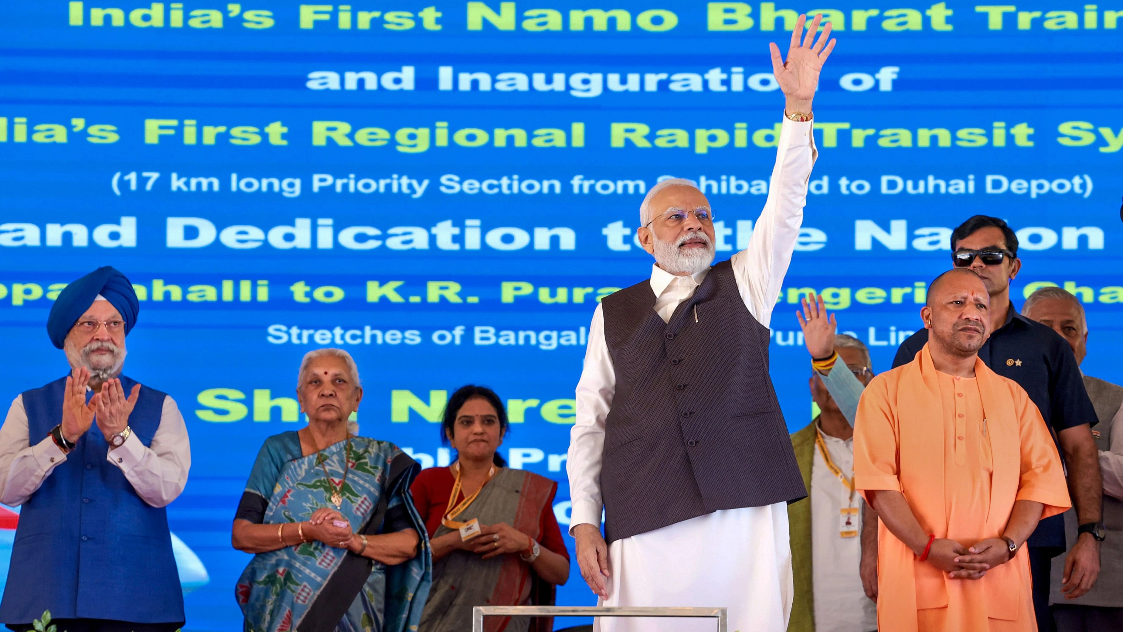 <div class="paragraphs"><p>Prime Minister Narendra Modi during flagging off the RapidX train between Sahibabad to Duhai Depot, in Ghaziabad, Friday, Oct. 20, 2023. Union Minister Hardeep Singh Puri, Uttar Pradesh Governor Anandiben Patel and Chief Minister Yogi Adityanath are also seen. (PTI Photo) (PTI10_20_2023_000269B)</p></div>