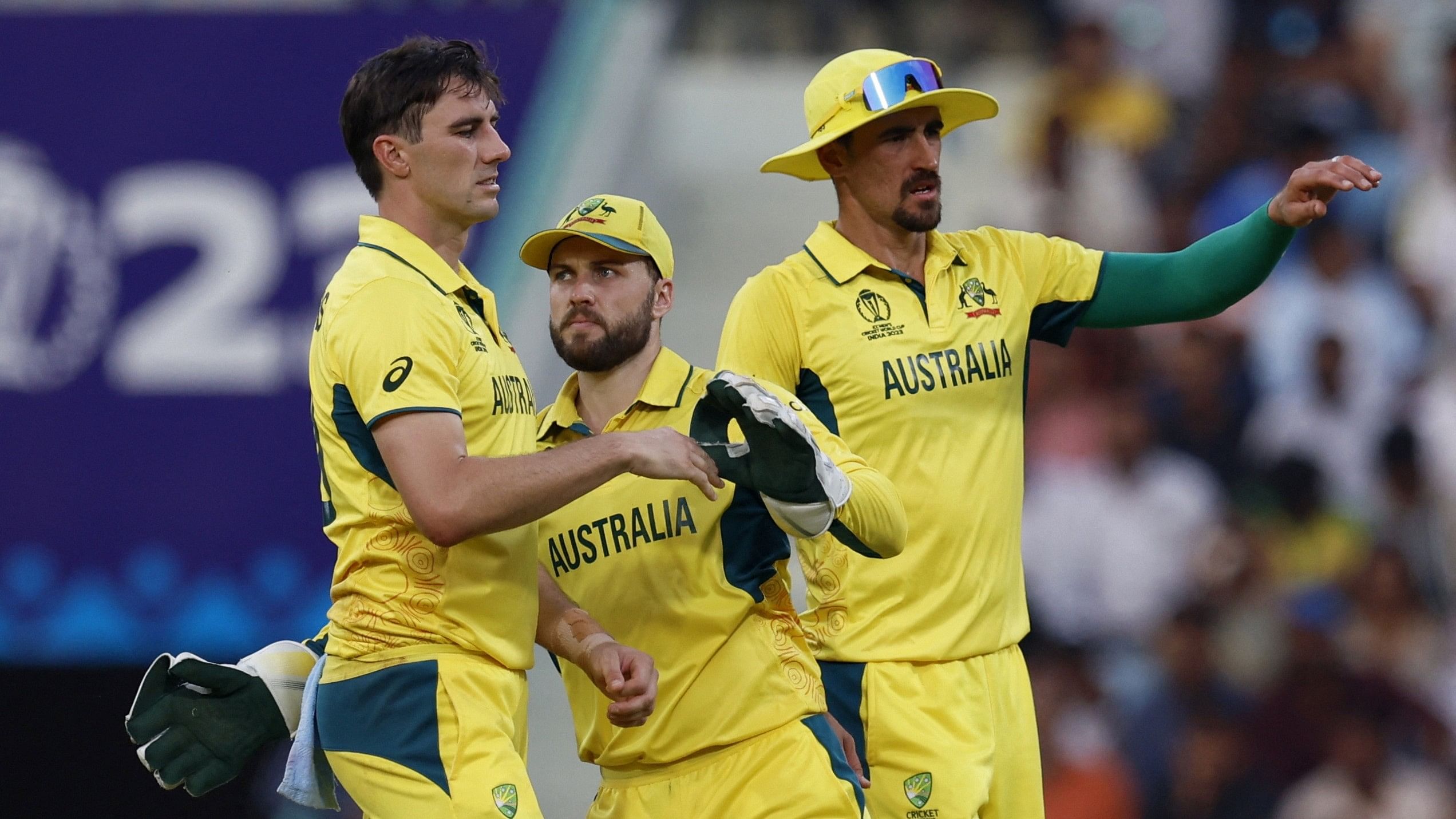 <div class="paragraphs"><p> Australia's Pat Cummins celebrates with Mitchell Starc and Josh Inglis at the Bharat Ratna Shri Atal Bihari Vajpayee Ekana Cricket Stadium, Lucknow.</p></div>