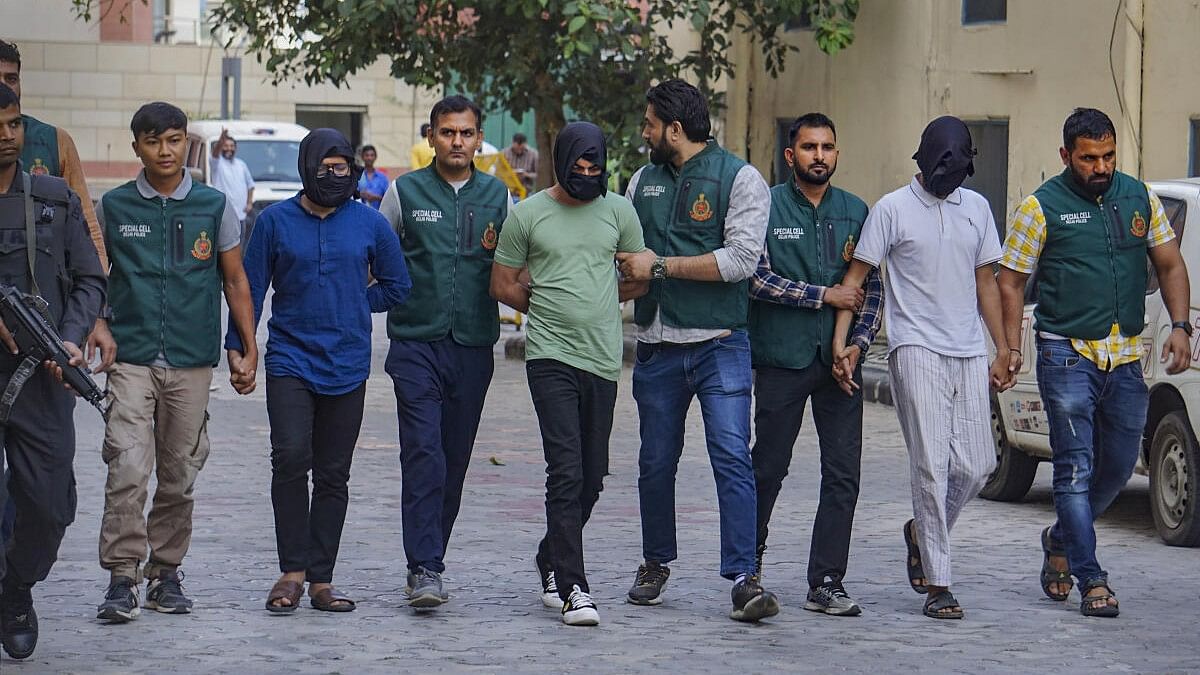 <div class="paragraphs"><p>Delhi Police's Special Cell with suspected terrorist Shahnawaz and others after arresting them over their alleged links with an ISIS module, in New Delhi.</p></div>