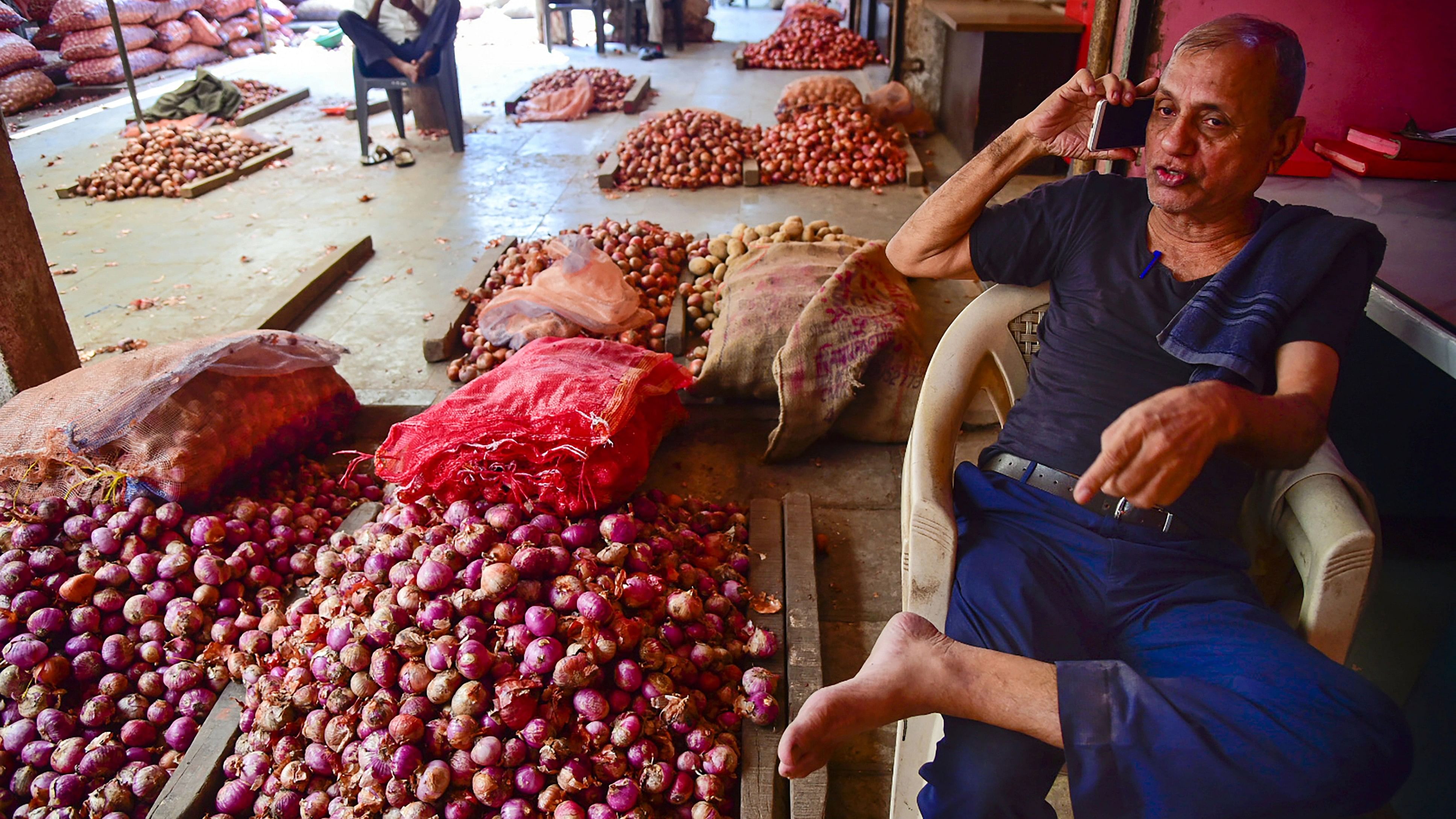 <div class="paragraphs"><p>An onion vendor waits for customers at APMC Onion-Potato Market, in Navi Mumbai, Tuesday, Oct. 31, 2023.  </p></div>