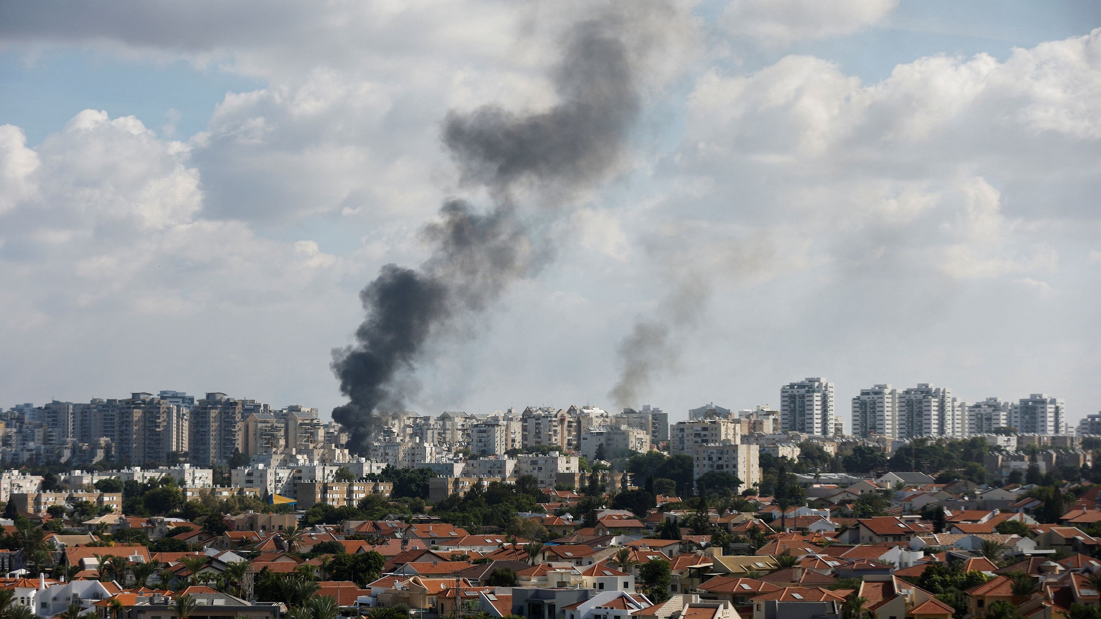 <div class="paragraphs"><p>Smoke rises in the aftermath of rocket barrages that were launched from Gaza, in Ashkelon, Israel October 7, 2023.</p></div>