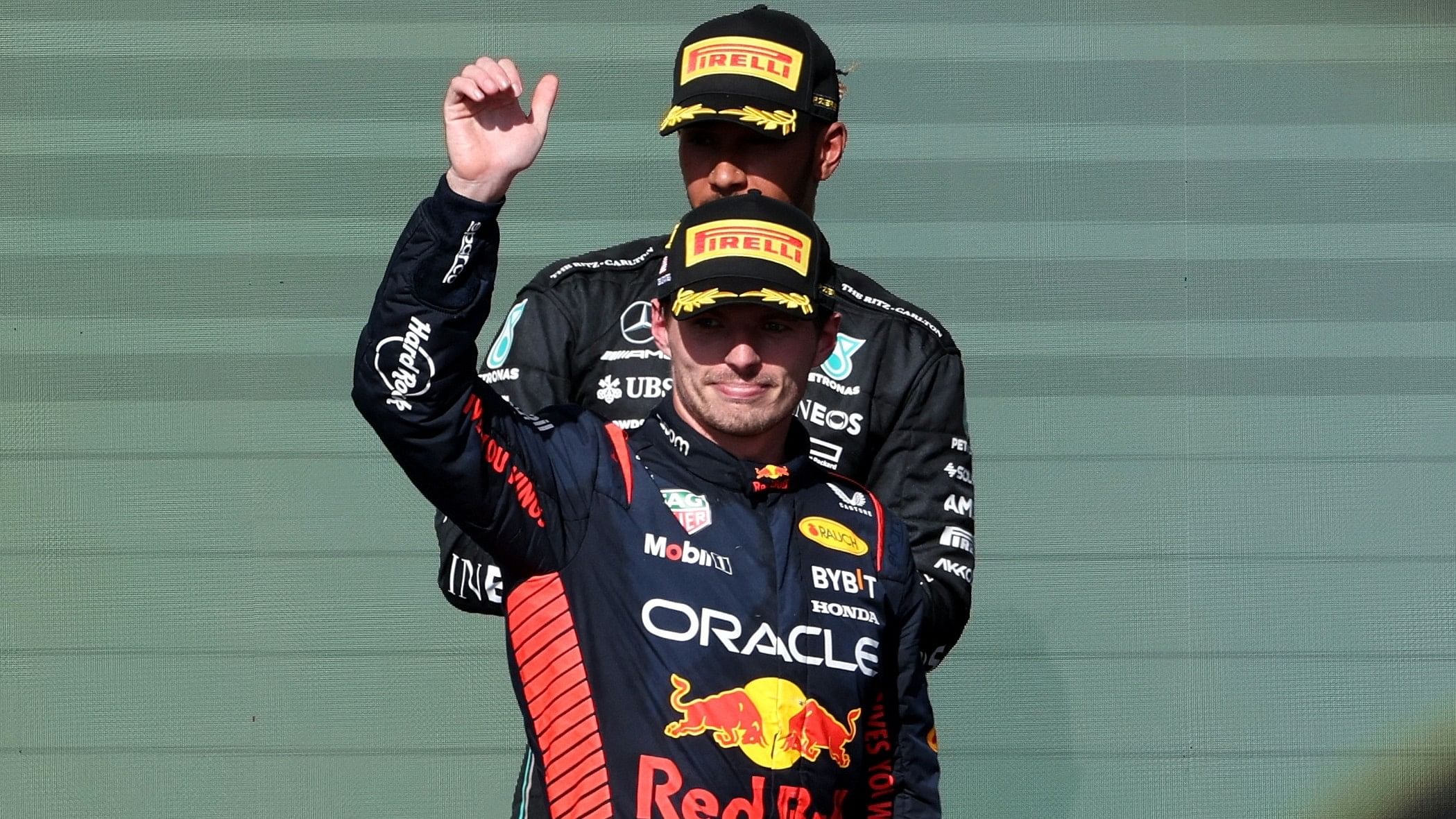 <div class="paragraphs"><p> Red Bull's Max Verstappen celebrates on the podium after winning the United States Grand Prix with second-placed Mercedes' Lewis Hamilton.&nbsp;</p></div>
