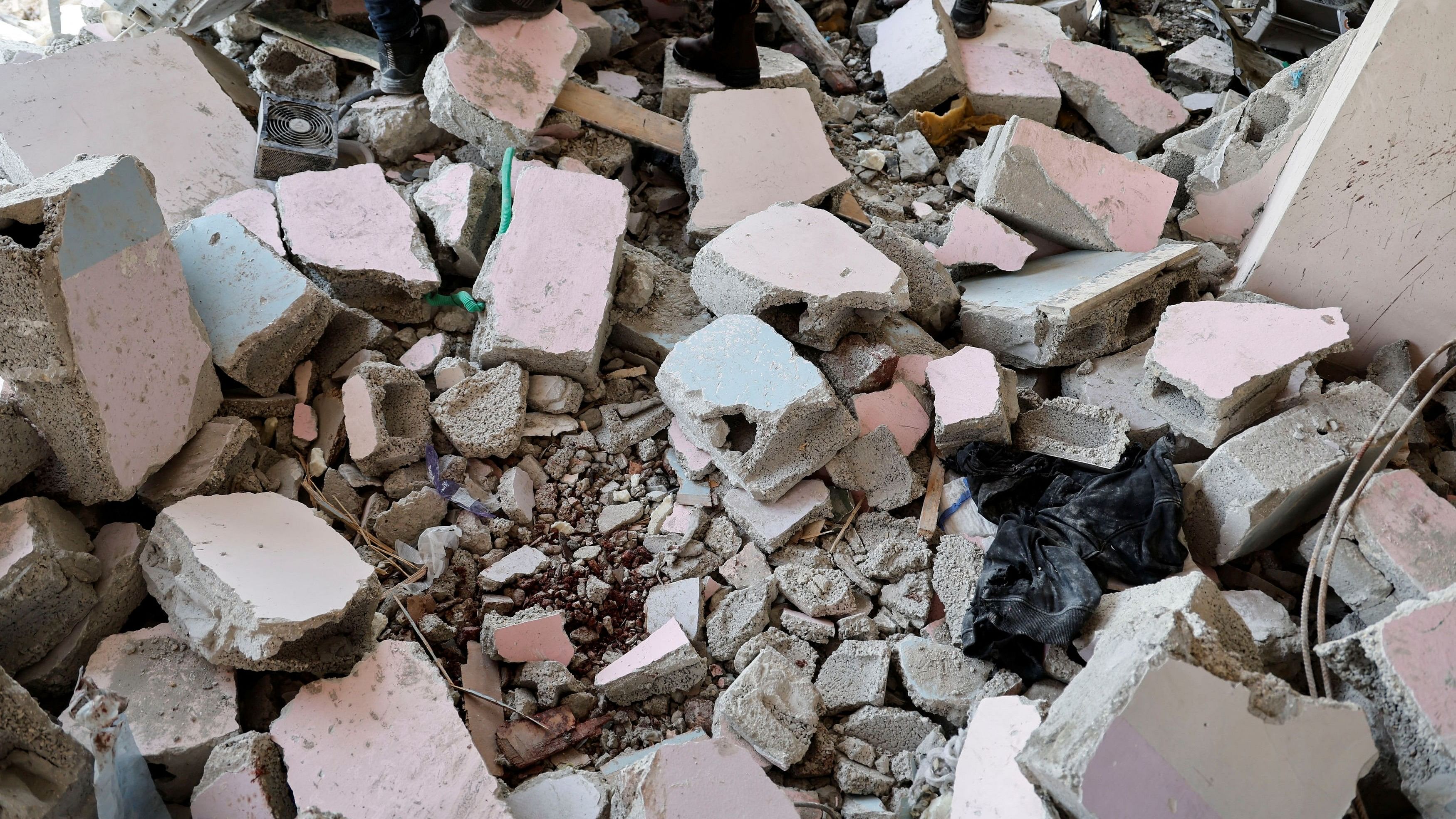 <div class="paragraphs"><p>Palestinians stand on rubble at a mosque which was hit in an Israeli air strike, in Jenin refugee camp in the Israeli-occupied West Bank October 22, 2023.</p></div>