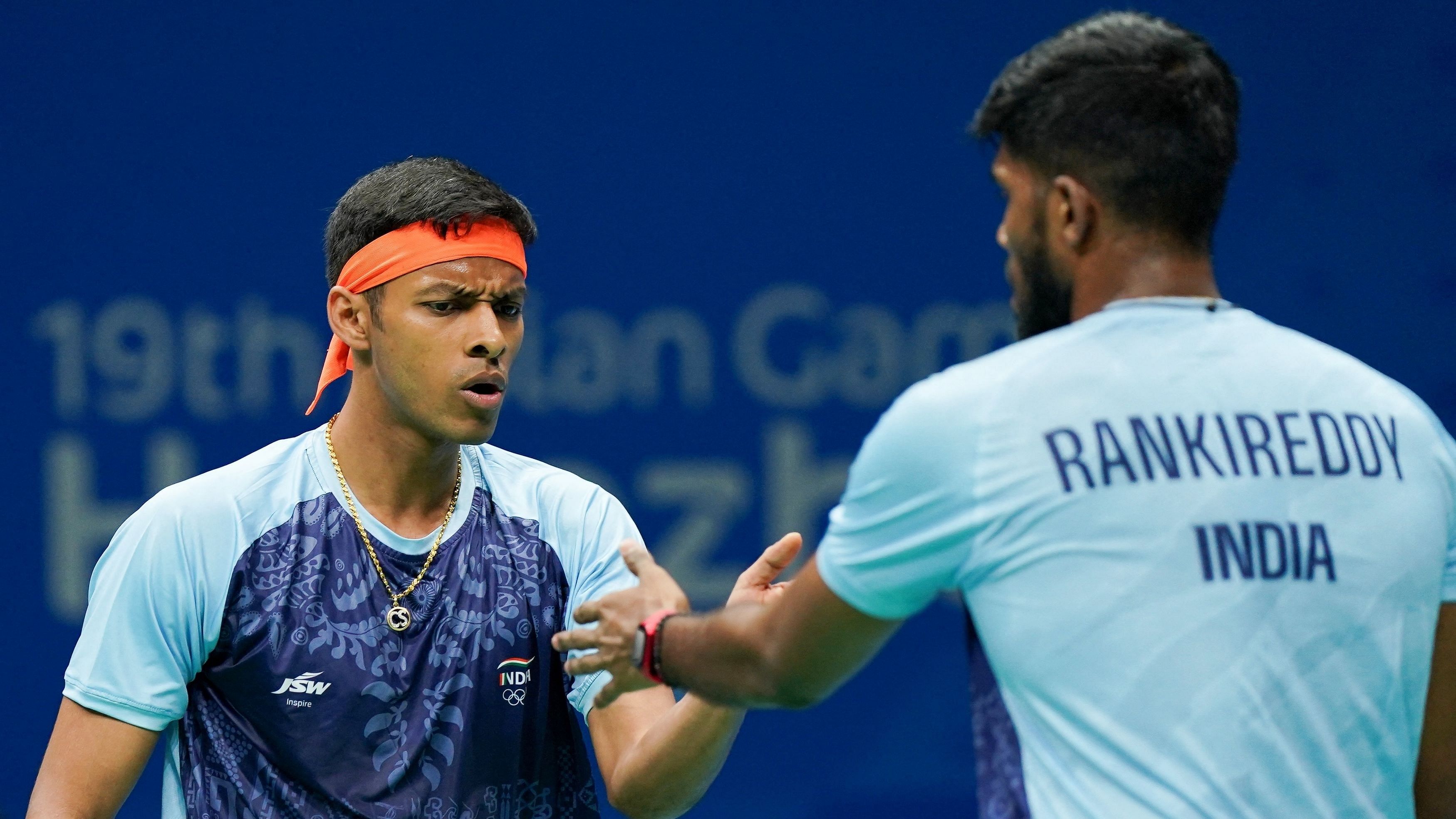 <div class="paragraphs"><p>India's Satwik Sairaj Rankireddy and Chirag Chandrashekhar Shetty react during the Men's Doubles final against South Korea's Choi Solgyu and Kim Wonho</p></div>