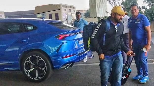 <div class="paragraphs"><p>Rohit Sharma with his&nbsp;Blue Lamborghini Urus.</p></div>