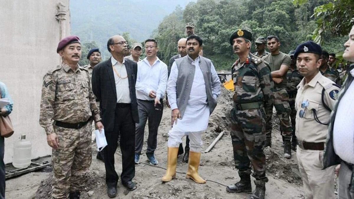 <div class="paragraphs"><p>Union Minister of State for Home Affairs Ajay Kumar Mishra takes stock of the damages following flash floods, in Rangpo, Sikkim, Saturday, Oct. 7, 2023.</p></div>