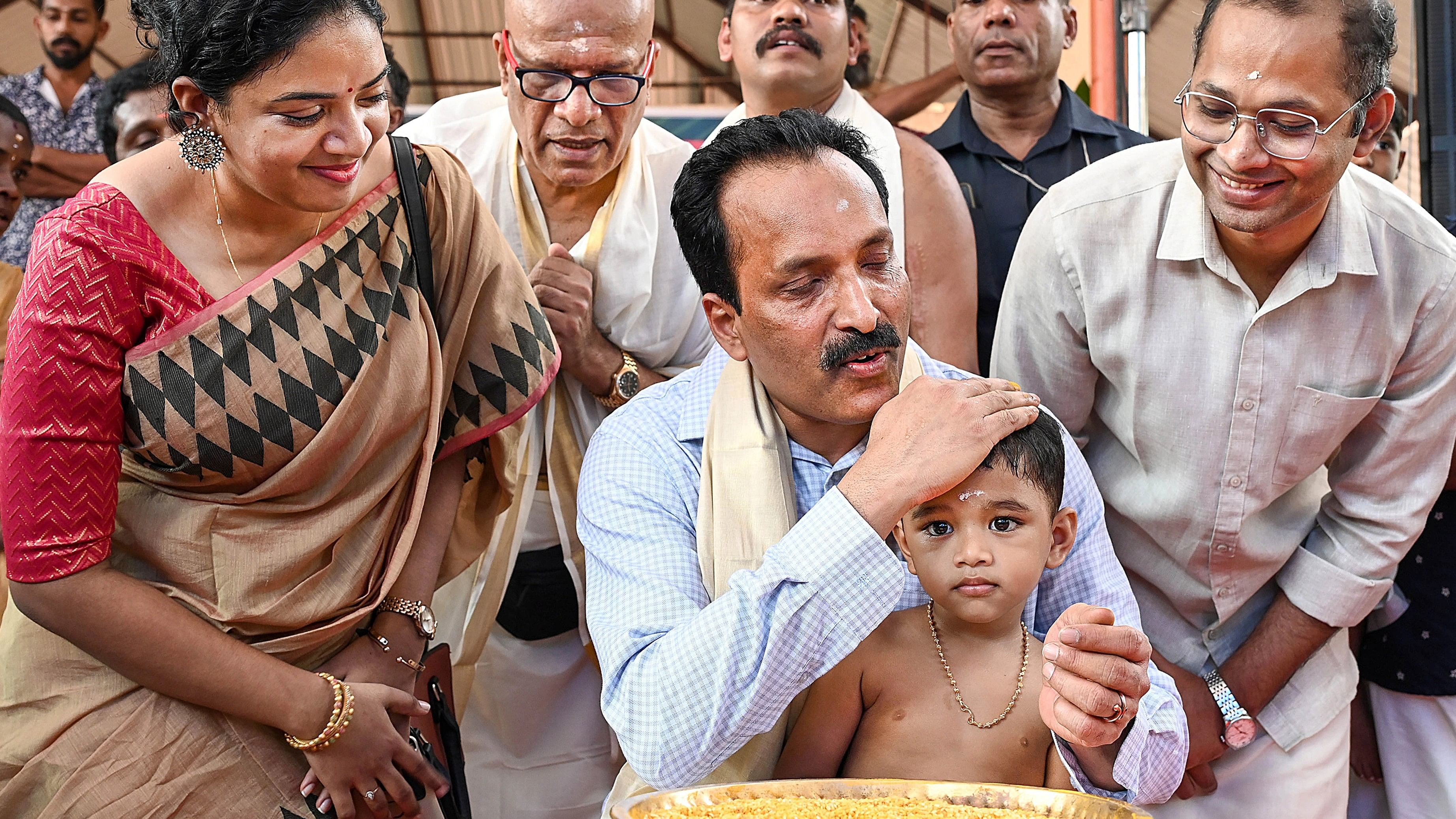 <div class="paragraphs"><p>ISRO chairman S. Somanath blesses a child during the Vidhyarambham ceremony on the occasion of 'Vijayadashami', in Thiruvananthapuram, Tuesday, Oct. 24, 2023. </p></div>