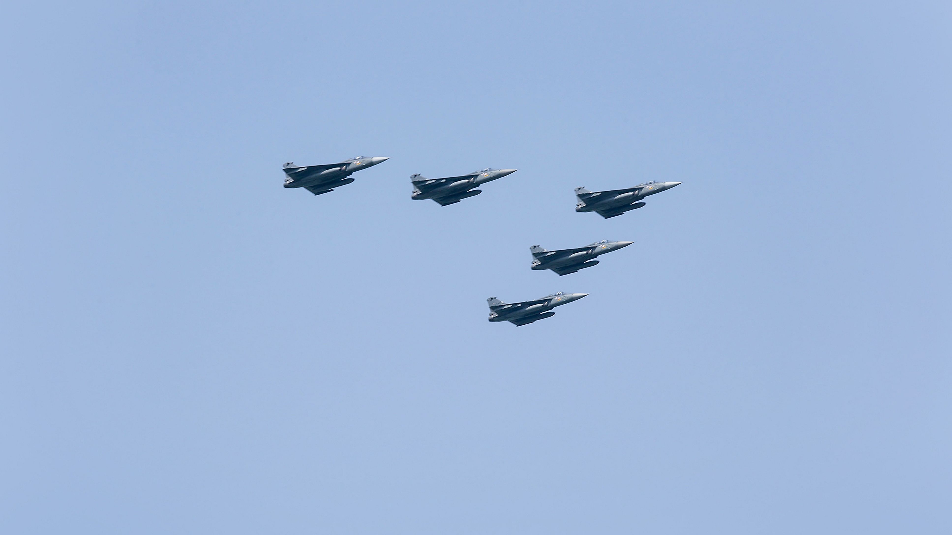 <div class="paragraphs"><p>Indian Air Force's (IAF) LCA Tejas fighters fly past in a formation during an air show, in Bhopal, Saturday, Sept. 30, 2023.</p></div>