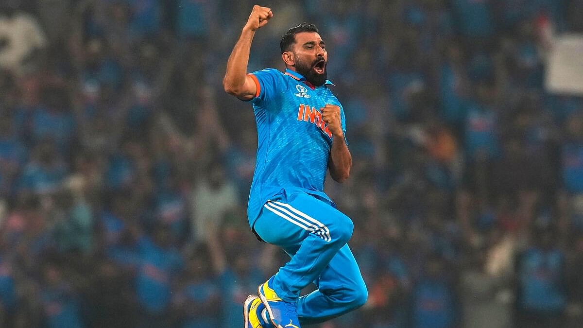 <div class="paragraphs"><p>India's Mohammed Shami celebrates the wicket of England's Moeen Ali during the ICC Men's Cricket World Cup 2023 match between India and England.</p></div>