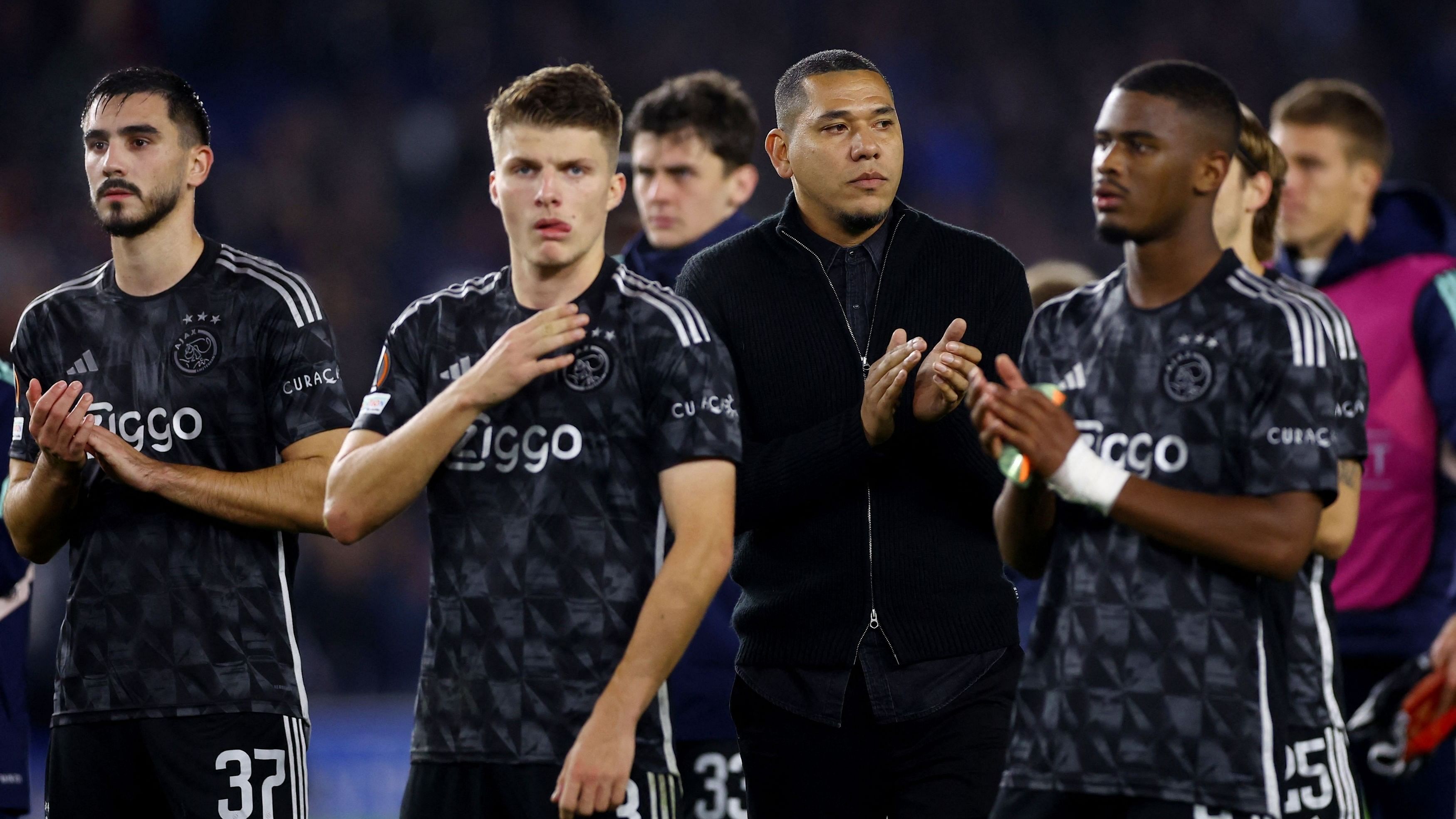 <div class="paragraphs"><p>Ajax Amsterdam interim manager Hedwiges Maduro and the players applaud fans after the match.</p></div>