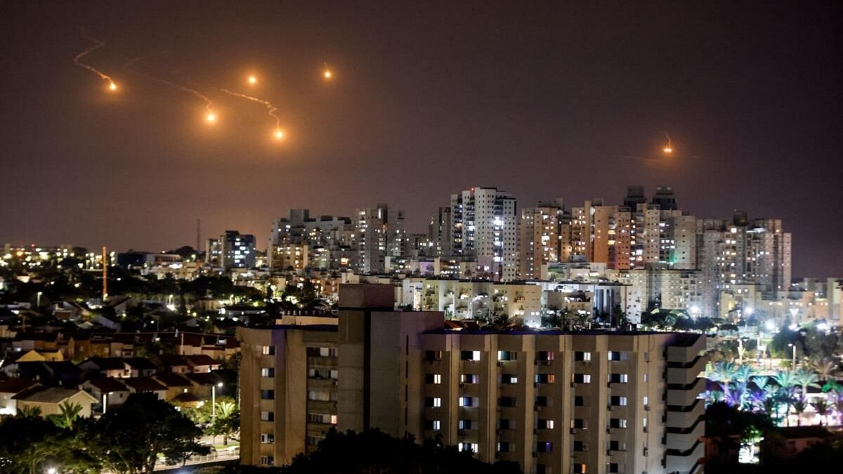 <div class="paragraphs"><p>Flares illuminate the sky over northern Gaza, as seen from Ashkelon, southern Israel.</p></div>