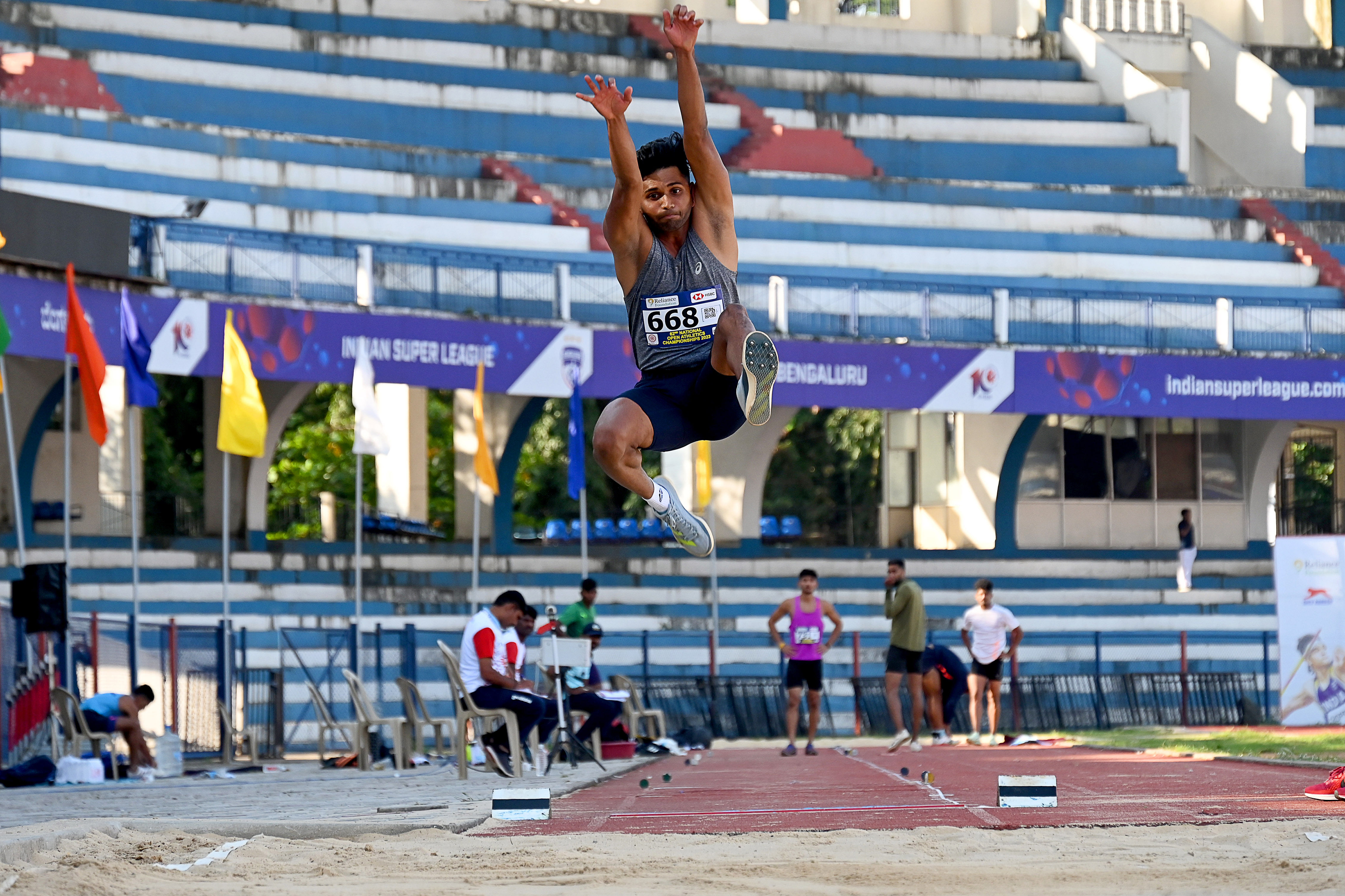 <div class="paragraphs"><p>Karnataka's Arya S in action in the men's long jump during the 62nd National Open Athletics Championship at Sree Kanteerava Stadium on Friday. </p></div>