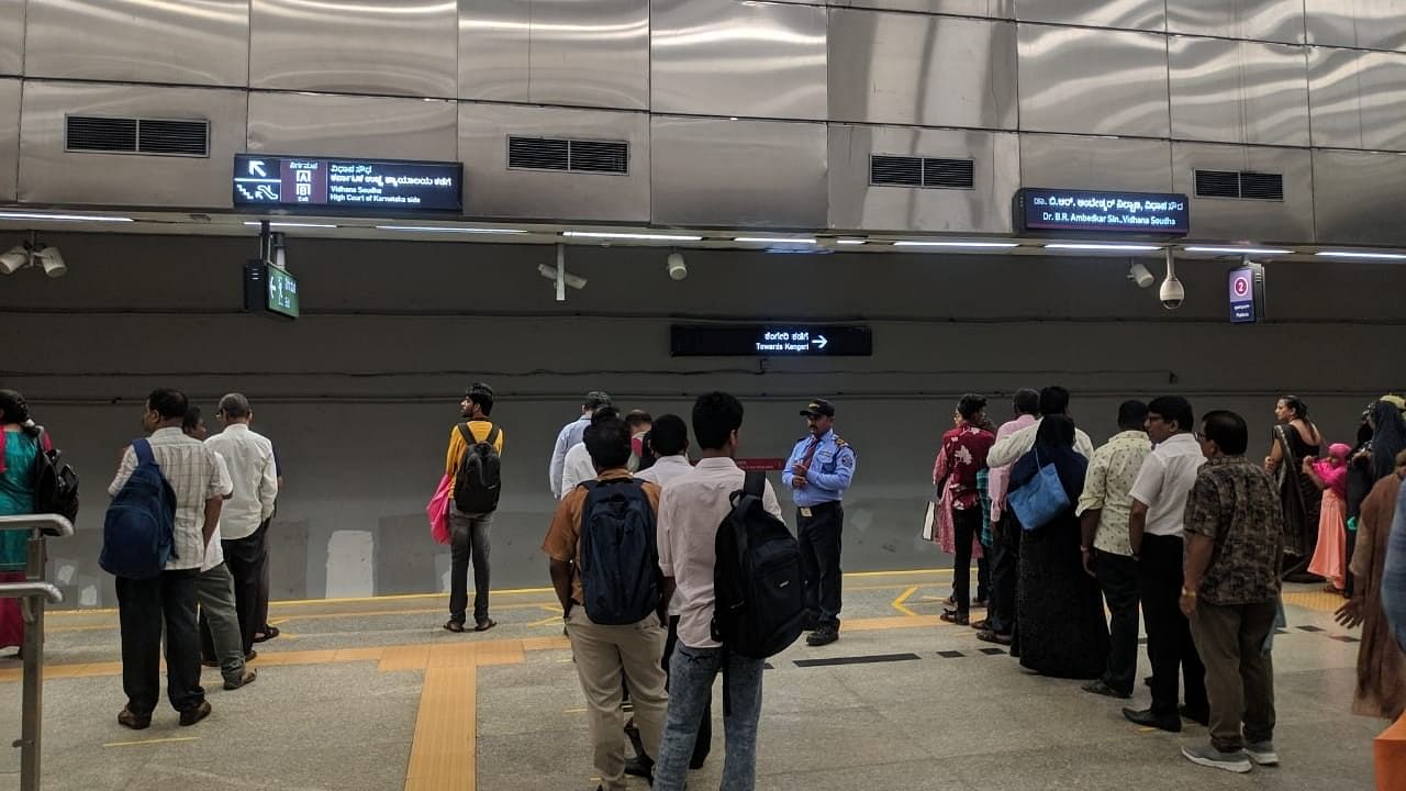 <div class="paragraphs"><p>Commuters wait for the train at the Vidhana Soudha station.&nbsp;</p></div>