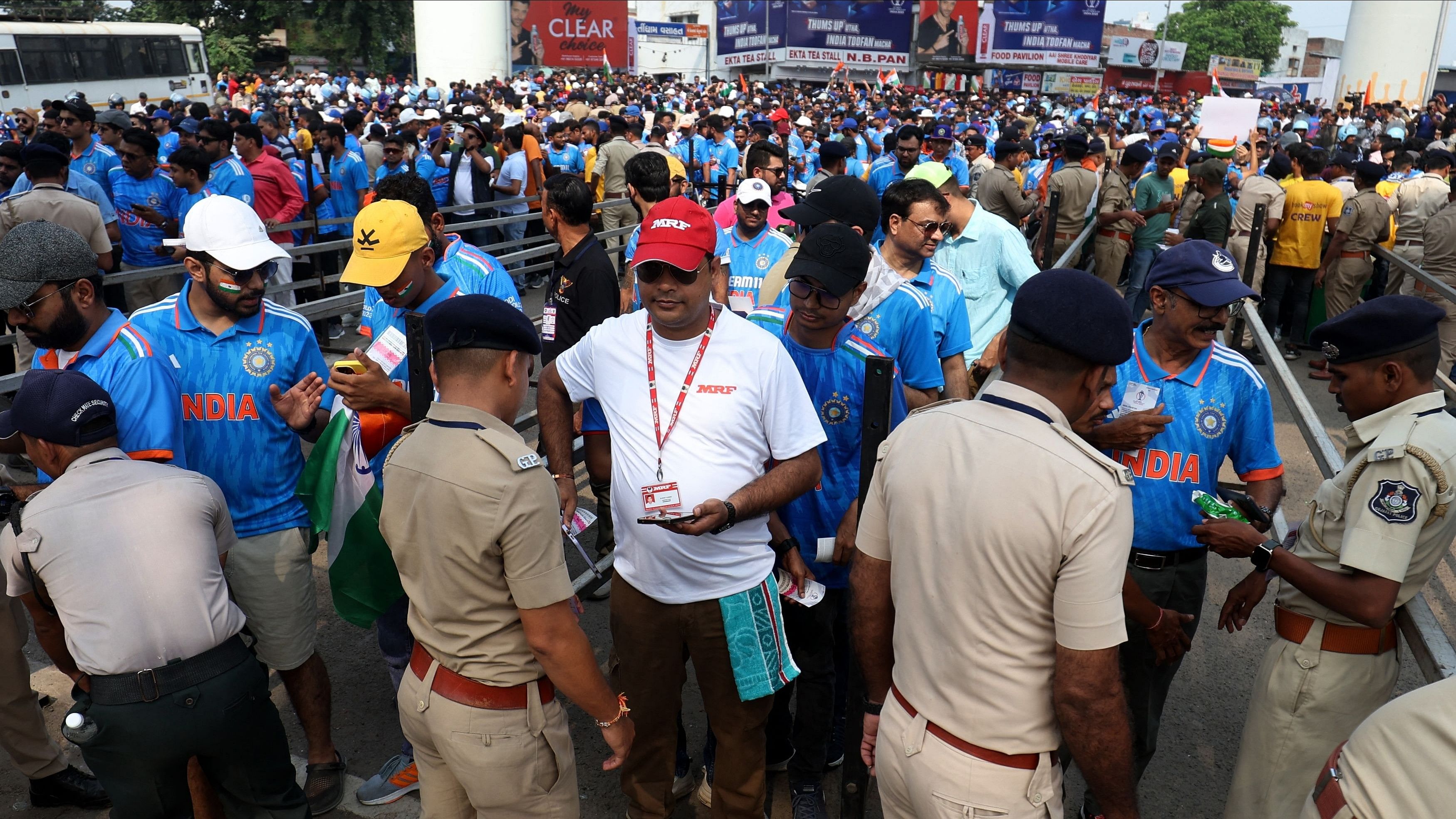 <div class="paragraphs"><p> India fans during the security check outside the stadium before the match.</p></div>