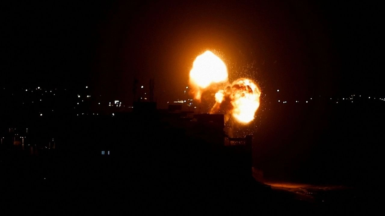 <div class="paragraphs"><p>Smoke and flames rise during Israeli airstrikes in Gaza City.</p></div>