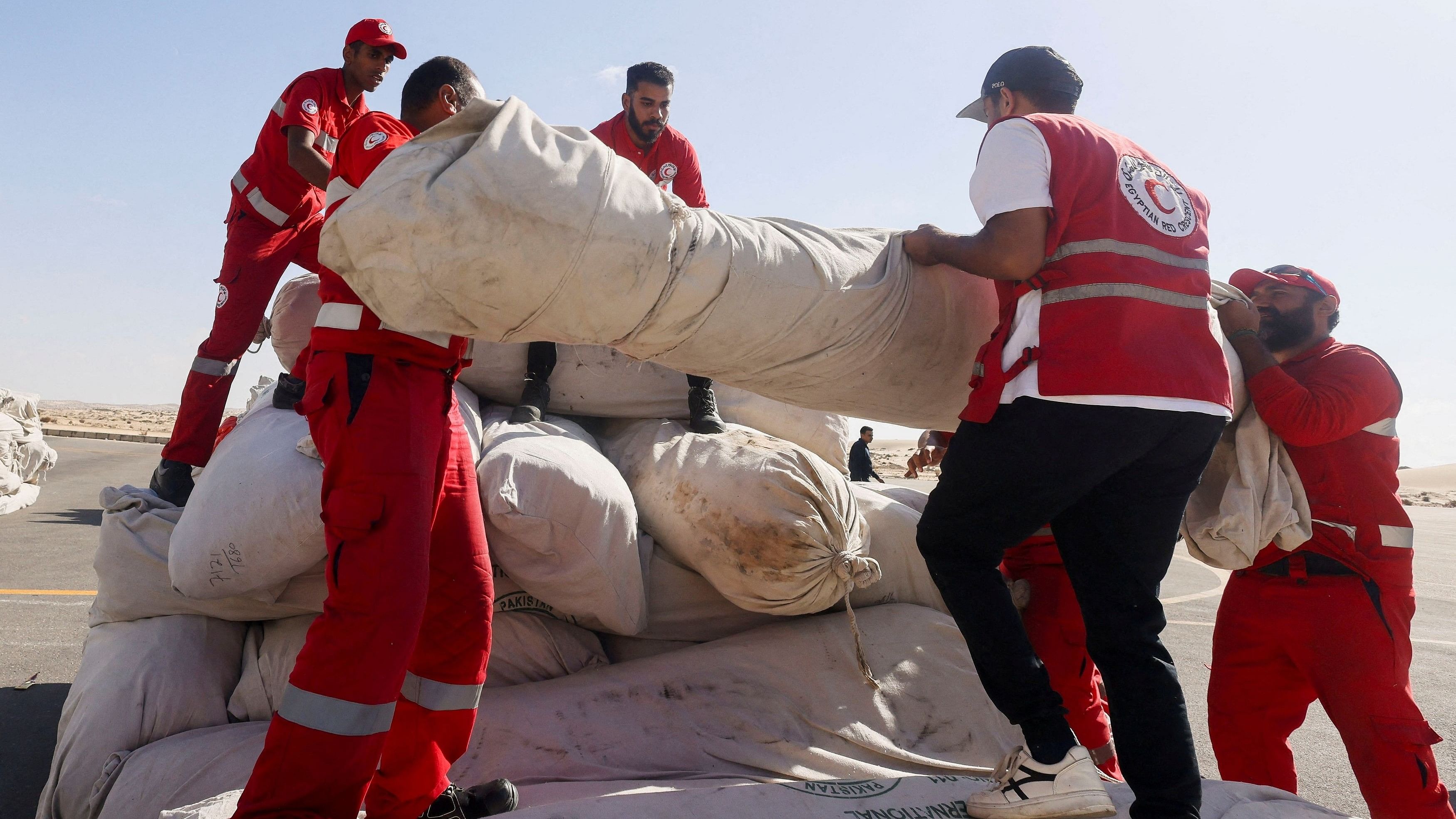 <div class="paragraphs"><p>Egyptian Red Crescent members coordinate aid for Gaza, after United Nations Secretary-General Antonio Guterres visited the Rafah border crossing between Egypt and the Gaza Strip, at Al Arish Airport, Egypt, October 20, 2023. </p></div>