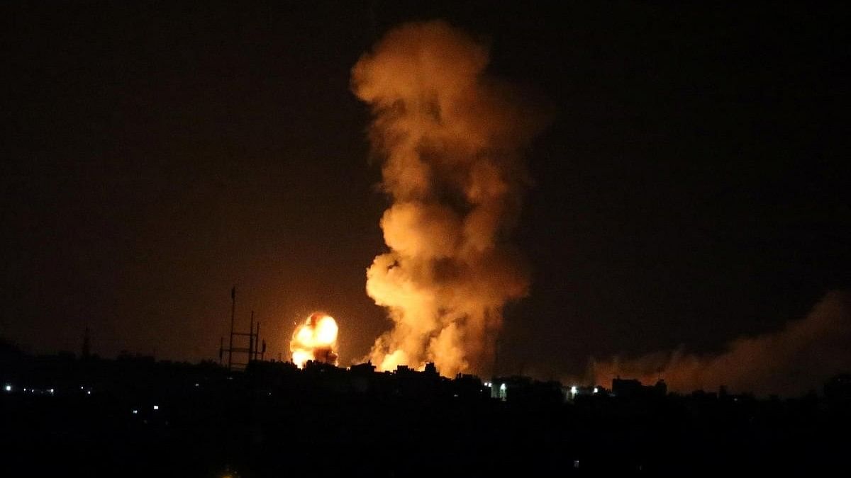 <div class="paragraphs"><p>An explosion is seen following an Israeli air strike in the southern Gaza Strip.</p></div>