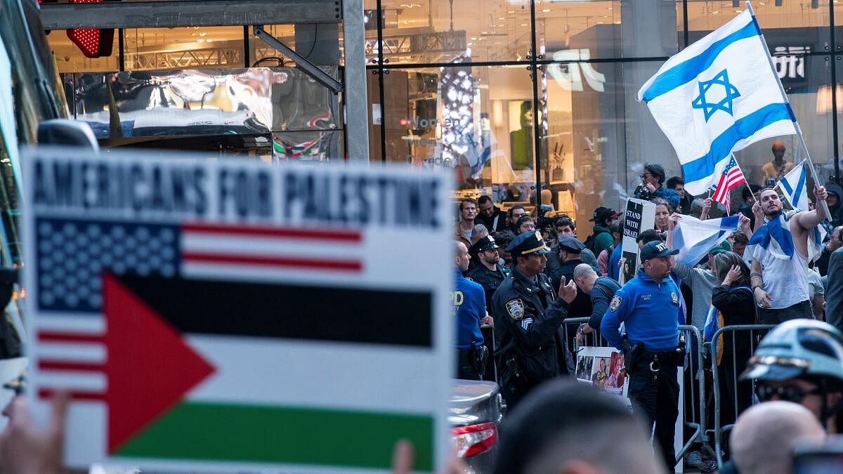 <div class="paragraphs"><p>Pro-Israeli supporters confront people attending a demonstration to express solidarity with Palestinians in Gaza, amid the ongoing conflict between Israel and the Palestinian Islamist group Hamas, in New York City</p></div>