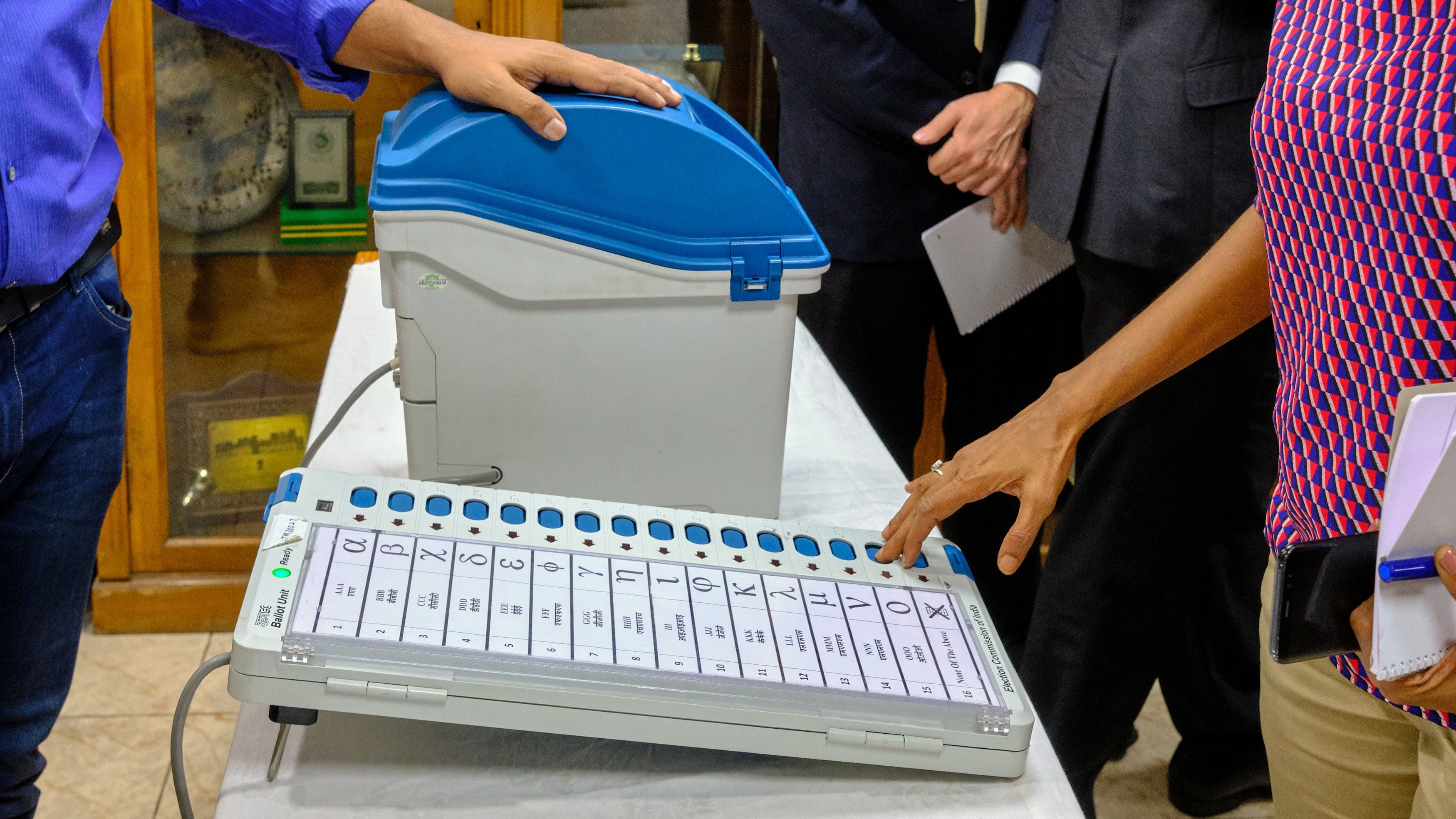 <div class="paragraphs"><p>Representative image showing an EVM and voters.</p></div>