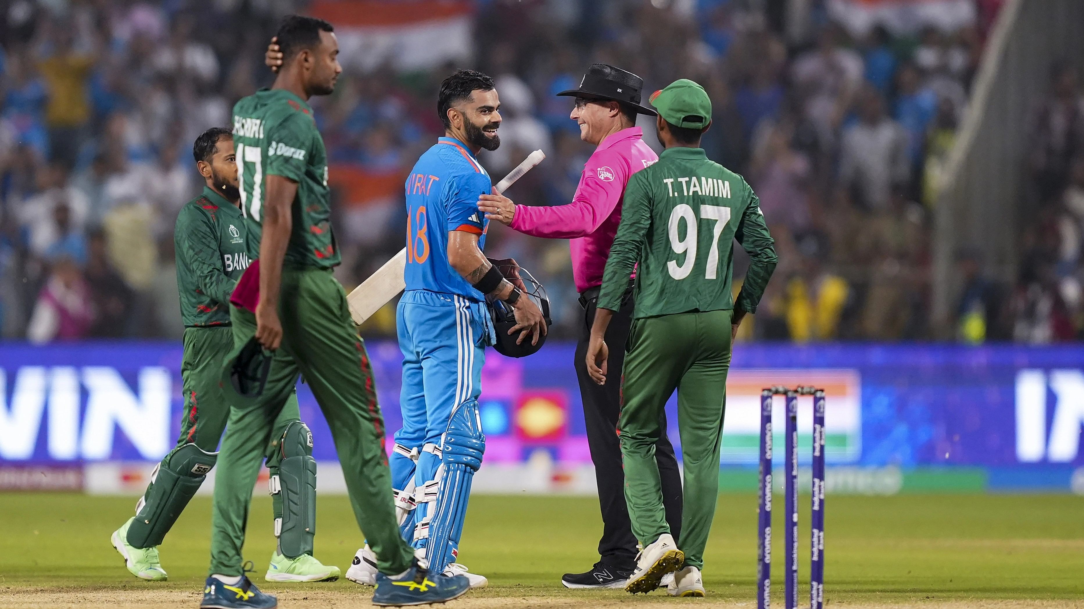 <div class="paragraphs"><p>Virat Kohli being congratulated by Bangladesh players after scoring the winning runs as well as his century during the ICC Men's Cricket World Cup 2023.</p></div>