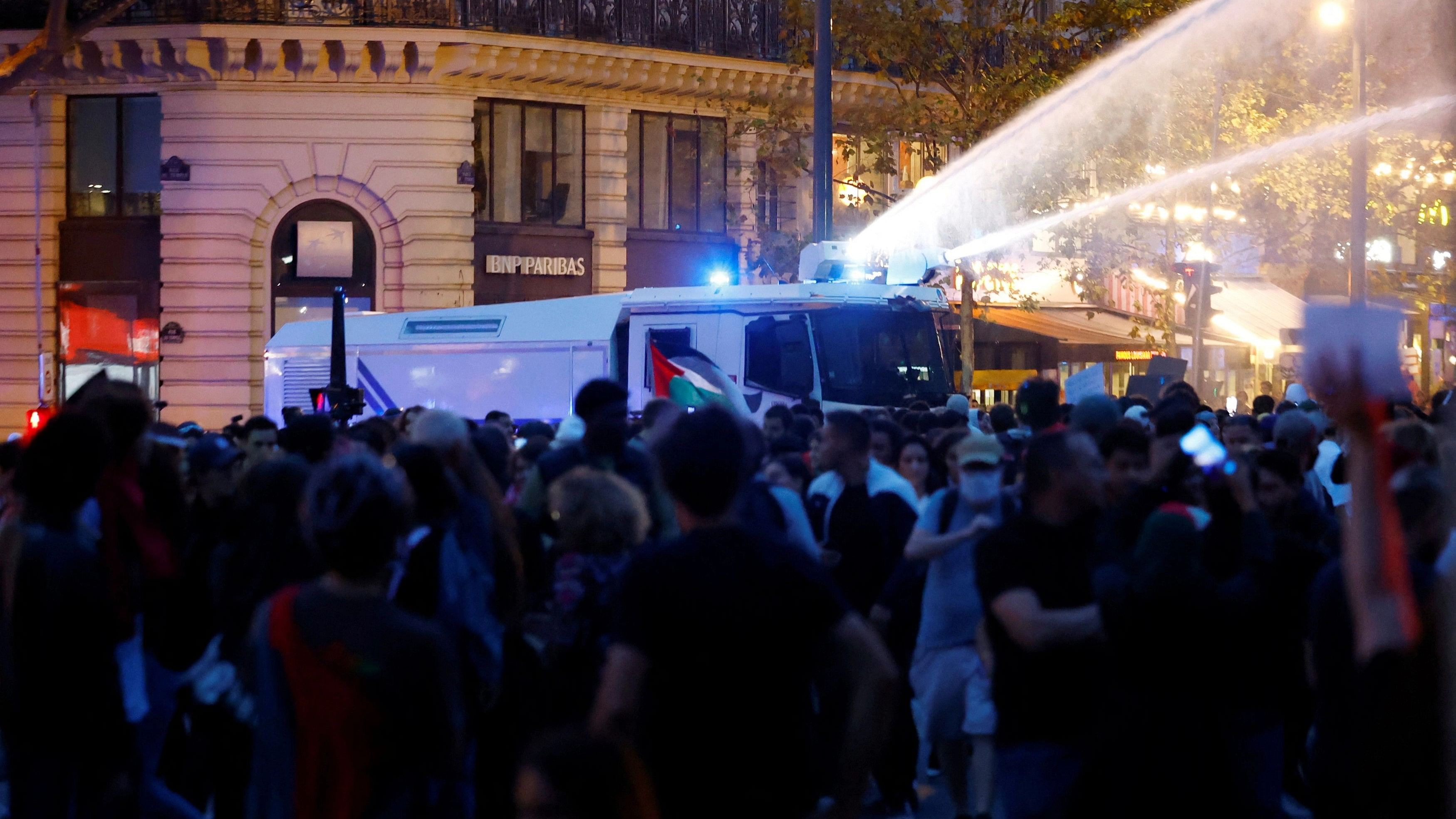 <div class="paragraphs"><p>French police use water canons to disperse protestors during an unauthorized demonstration in support of Palestinians, as part of the ongoing conflict between Israel and the Palestinian Islamist group Hamas, at Place de la Republique in Paris as French Interior Minister Gerald Darmanin ordered the systematic banning of pro-Palestinian demonstrations and the arrest of participants within France, October 12, 2023.</p></div>