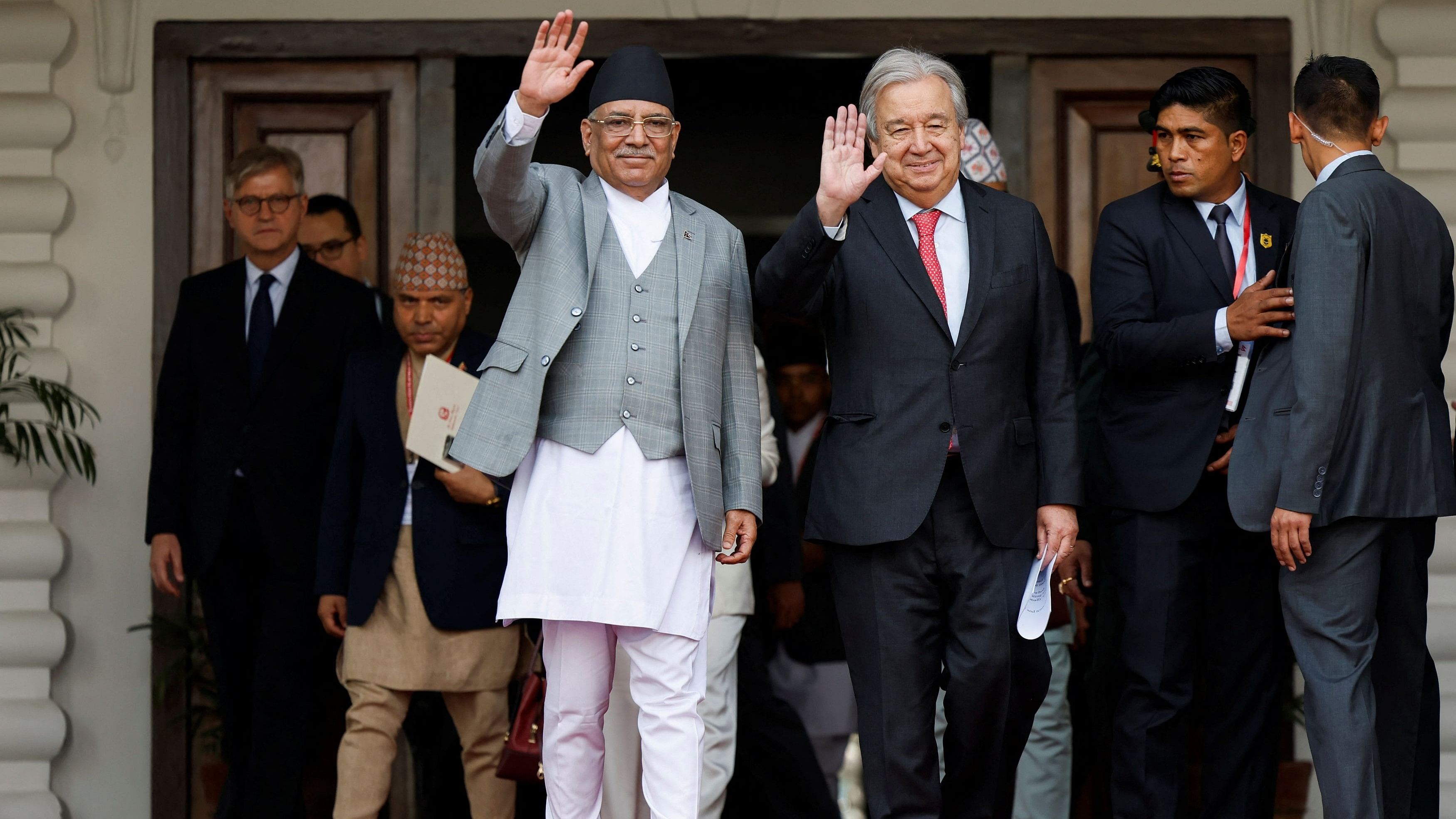 <div class="paragraphs"><p>United Nations Secretary-General Antonio Guterres along with Nepal's Prime Minister Pushpa Kamal Dahal, also known as Prachanda, waves toward the media after their meeting at Office of the Prime Minister and Council of Ministers at Singha Durbar in Kathmandu, Nepal October 29, 2023.</p></div>