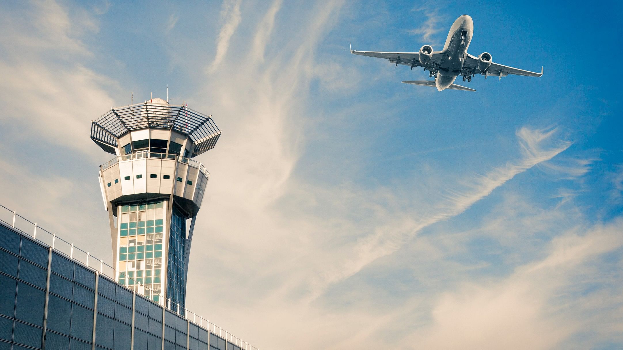 <div class="paragraphs"><p>Representative image showing an Air Traffic Control tower and plane in a French airport.</p></div>