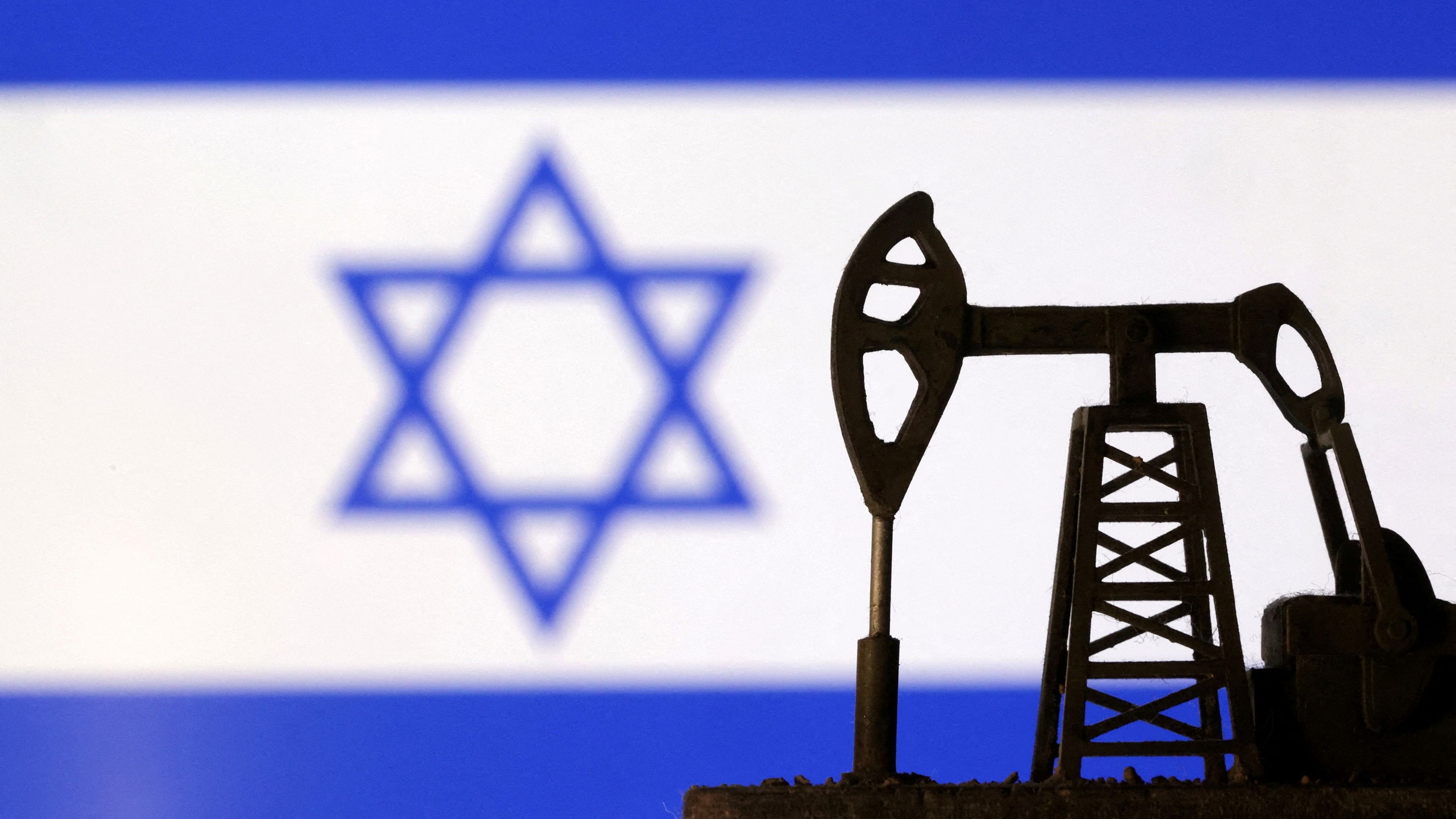 <div class="paragraphs"><p>An oil pump jack is seen in front of an Israeli flag in this illustration.</p></div>