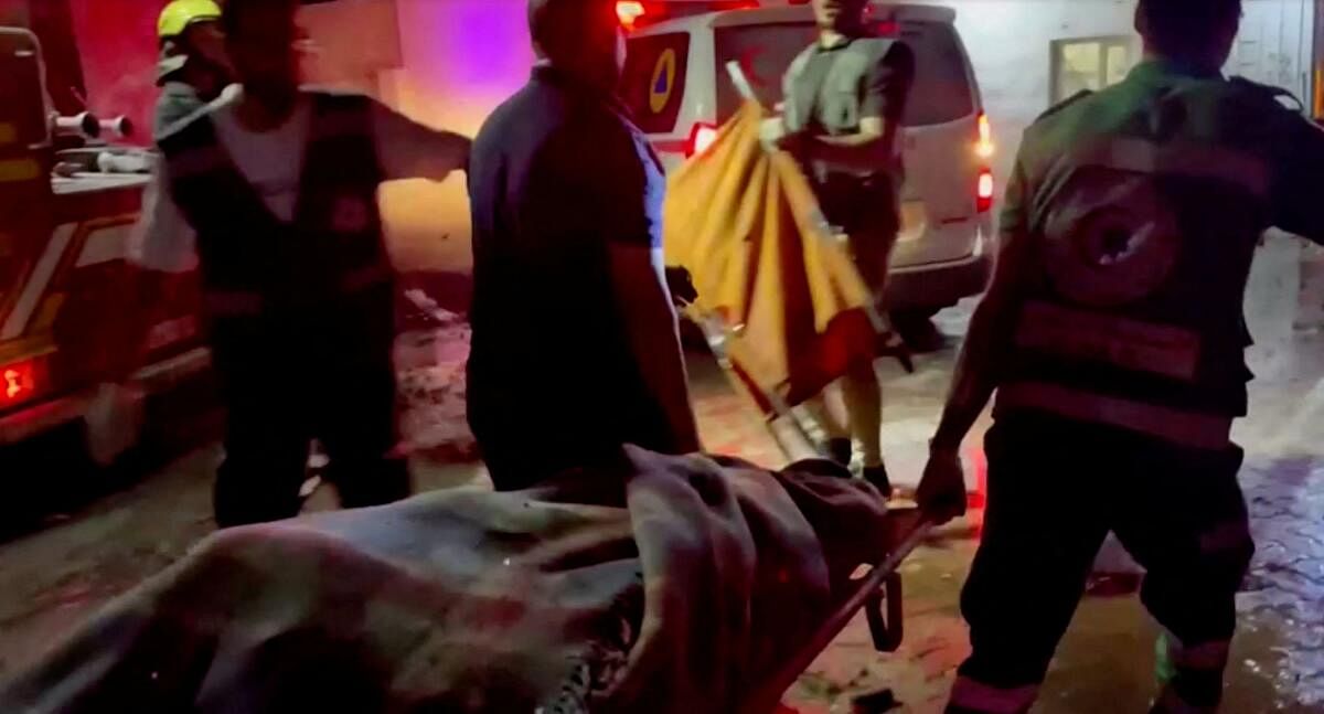 <div class="paragraphs"><p>Rescue personnel work at scene At Al-Ahli Hospital, which was hit by Israeli air strike, according to Gaza Health Ministry, in Gaza City, Gaza Strip, in this screen grab obtained from video, October 17, 2023.</p></div>