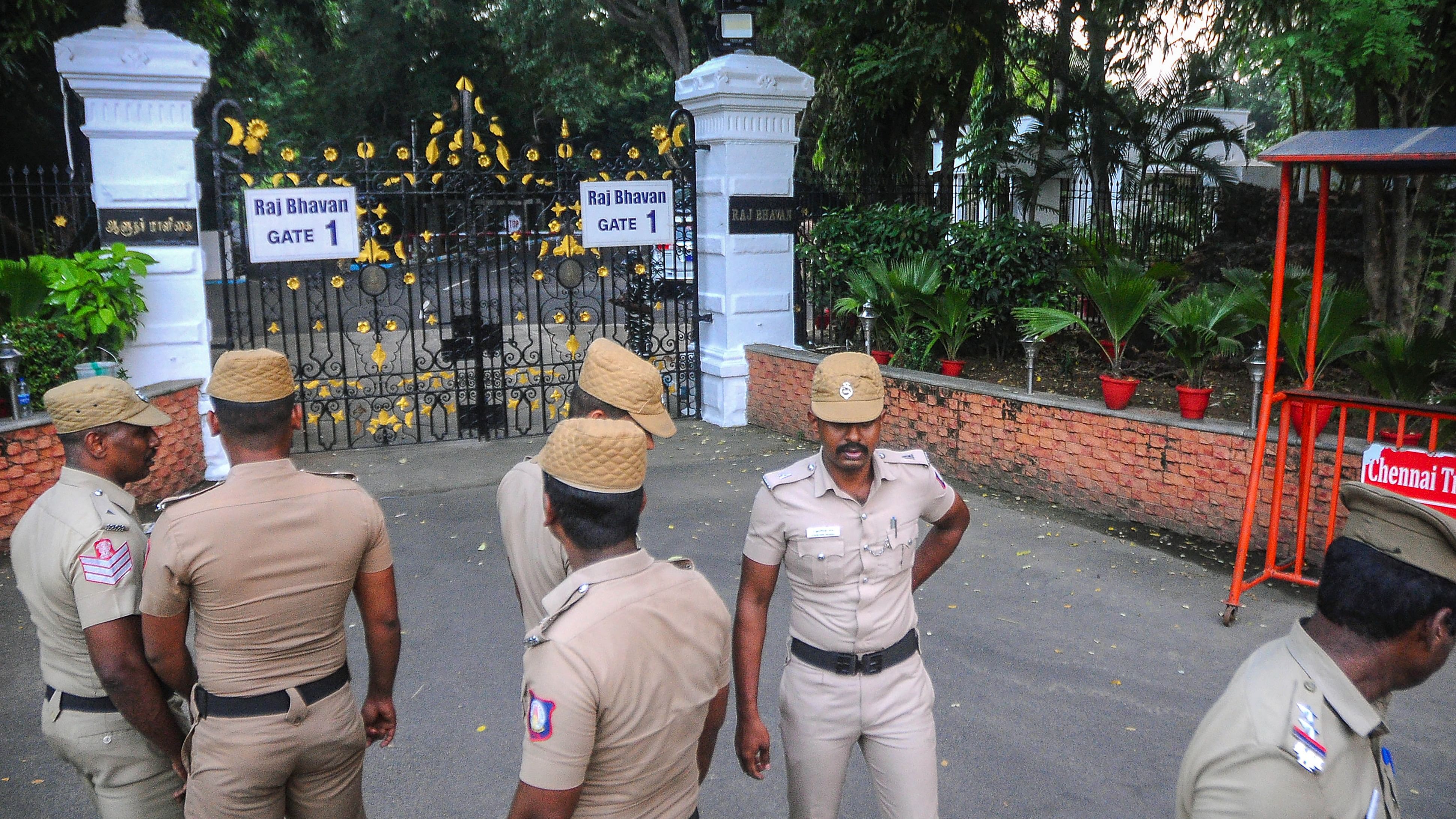 <div class="paragraphs"><p>Police personnel guard outside the Raj Bhavan after a petrol bomb was hurled outside its main gate, in Chennai, Wednesday, Oct. 25, 2023.</p></div>