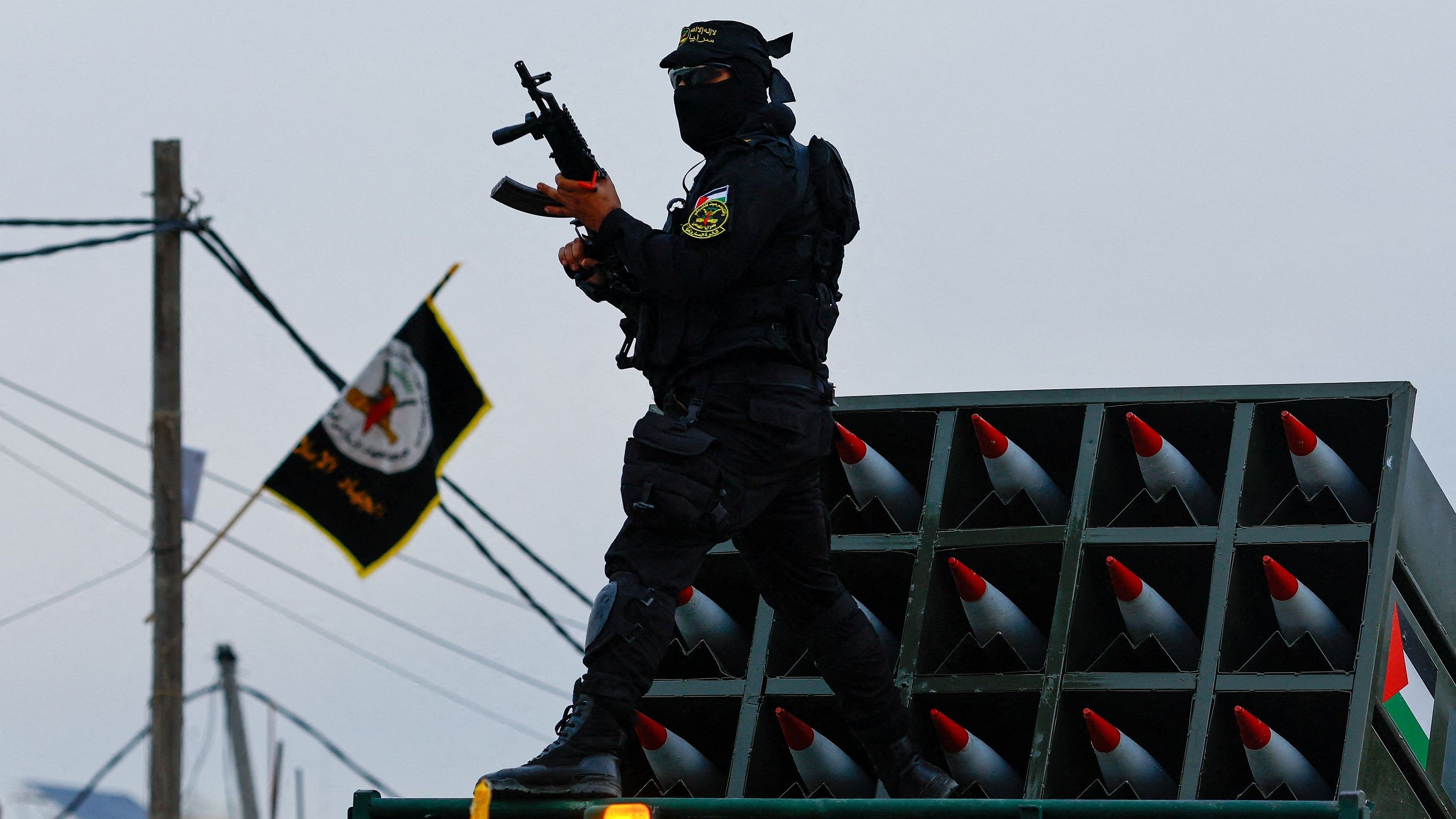 <div class="paragraphs"><p>File Photo: A Palestinian Islamic Jihad militant participates in an anti-Israel military parade marking the 36th anniversary of the movement's foundation in Gaza City, October 4, 2023.</p></div>