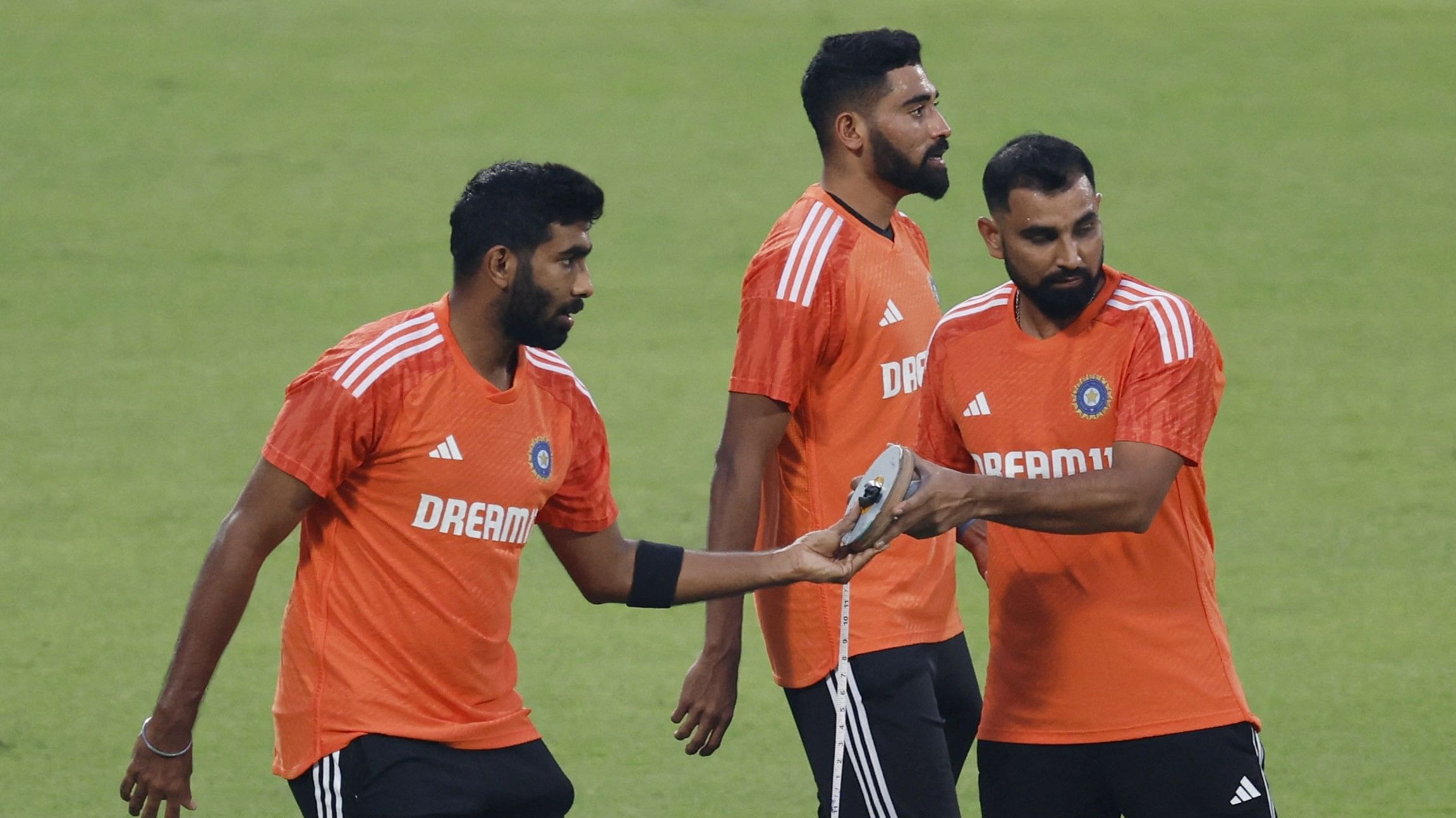 <div class="paragraphs"><p>India's Jasprit Bumrah, Mohammed Siraj and Mohammed Shami during practice.</p></div>